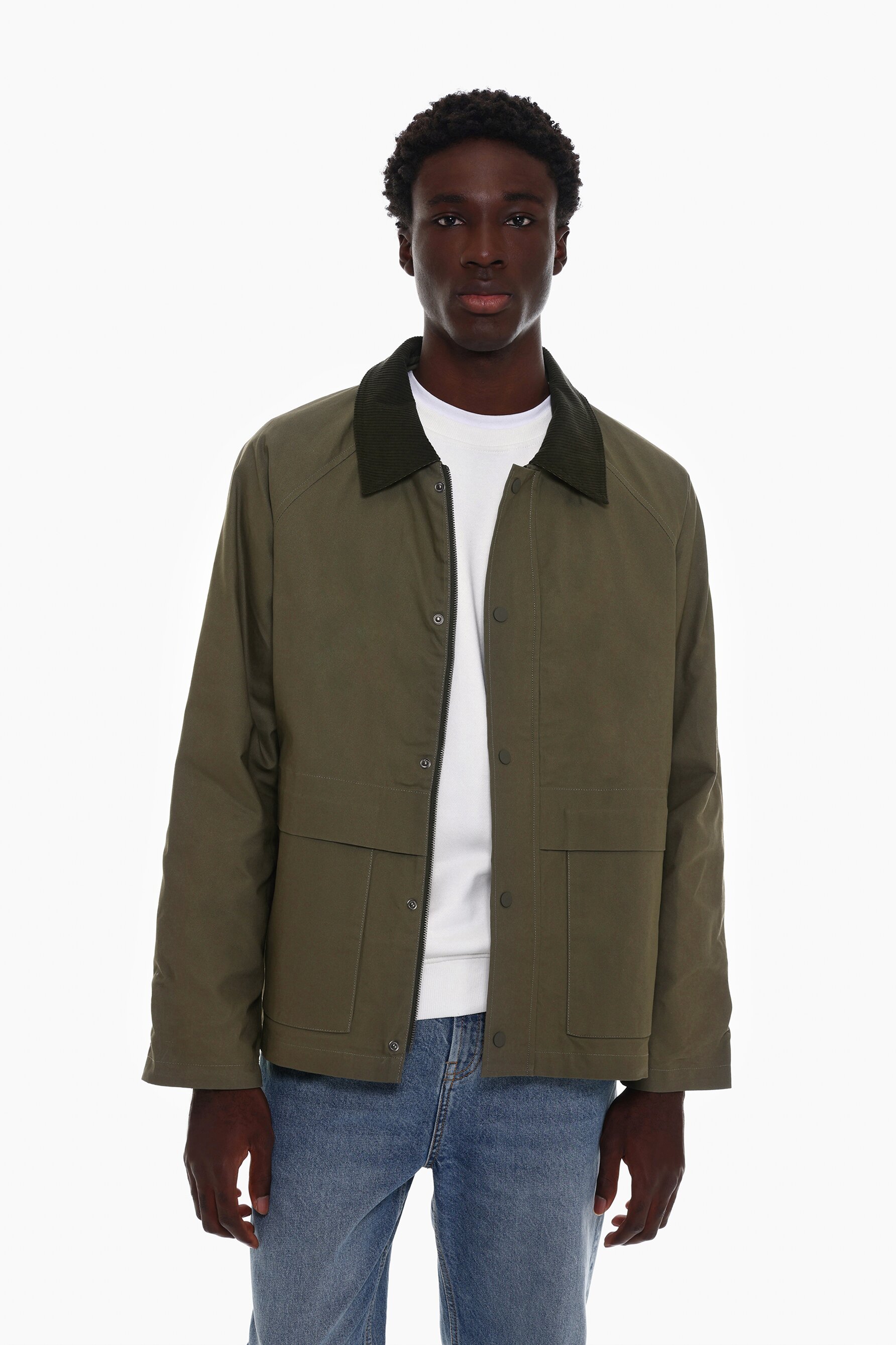 Waxed jacket with a corduroy collar