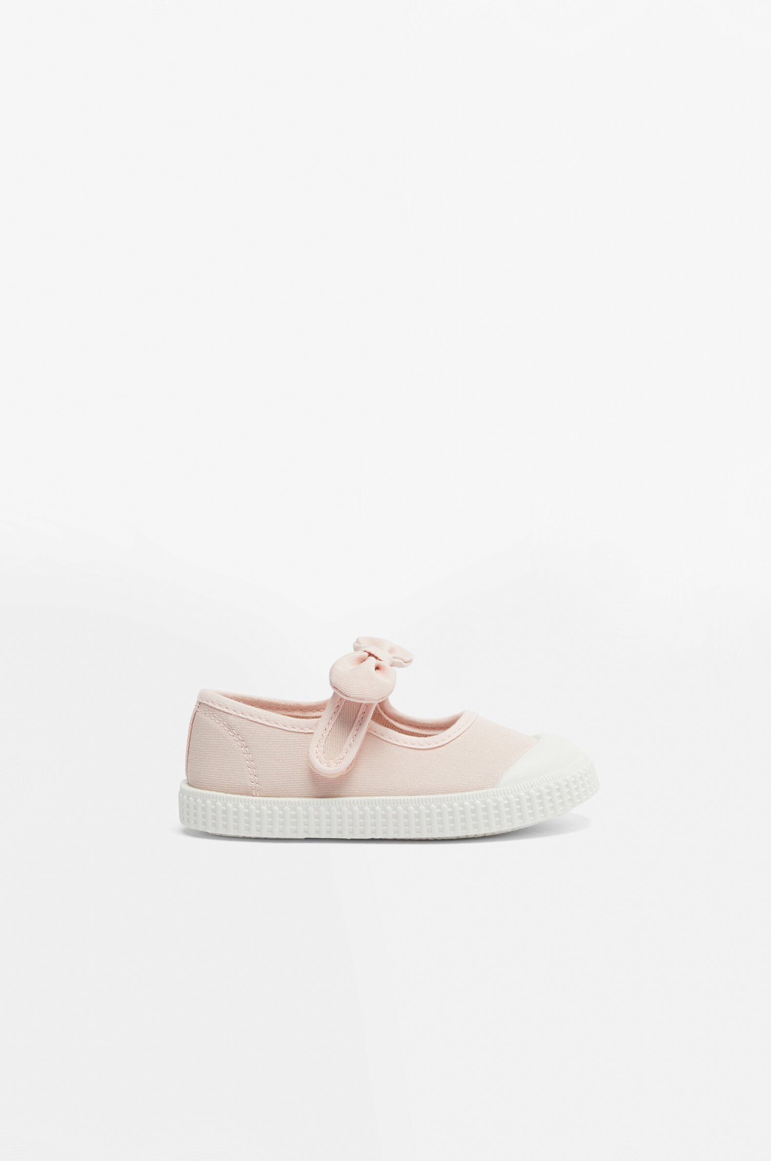 Sneakers with toecap and bow detail