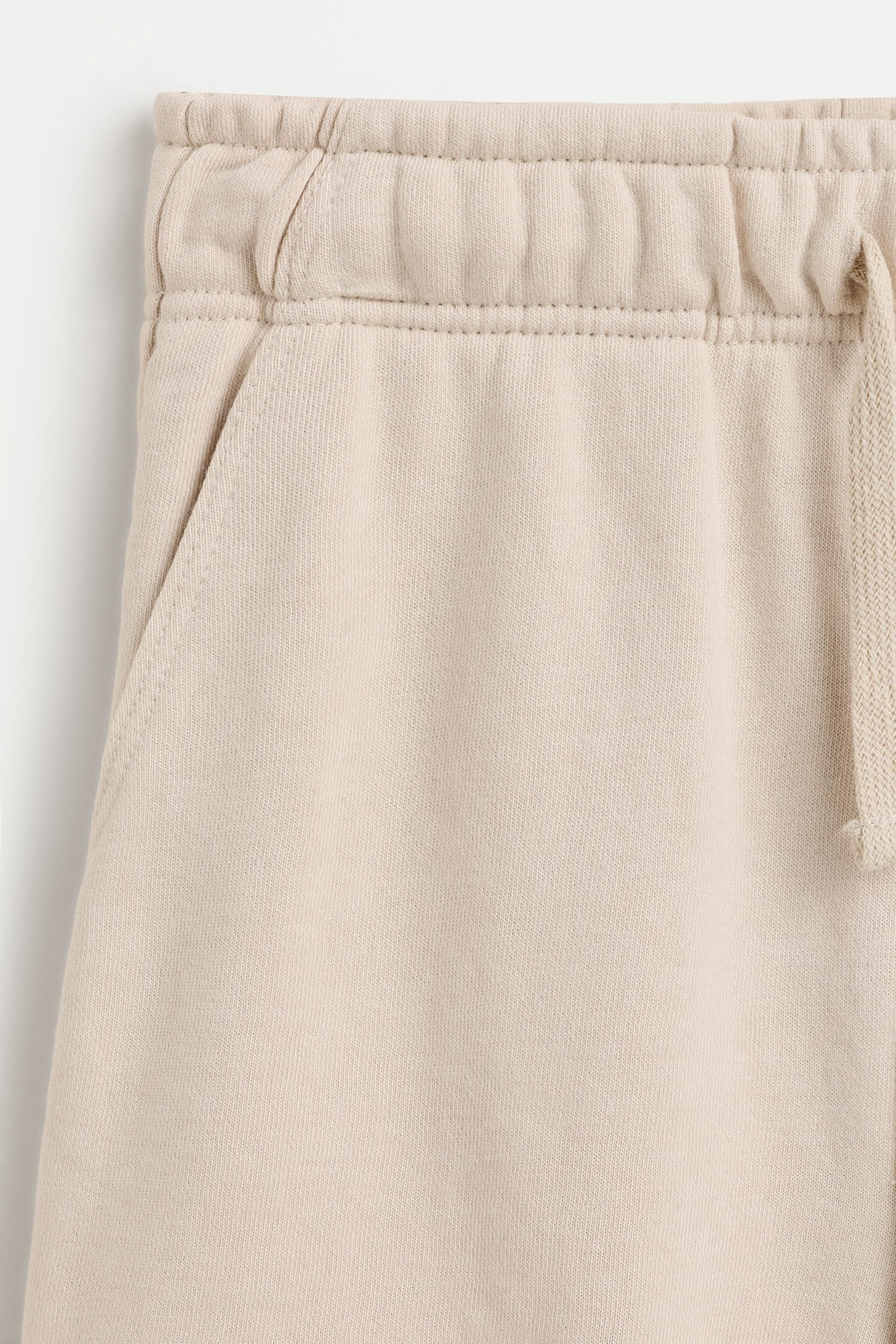 Jogger plush Bermuda shorts — PALE SAND