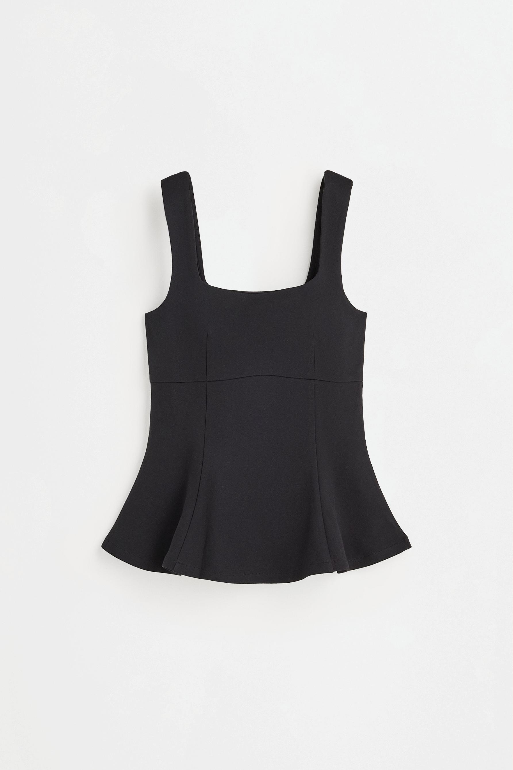 Interlock peplum top — BLACK