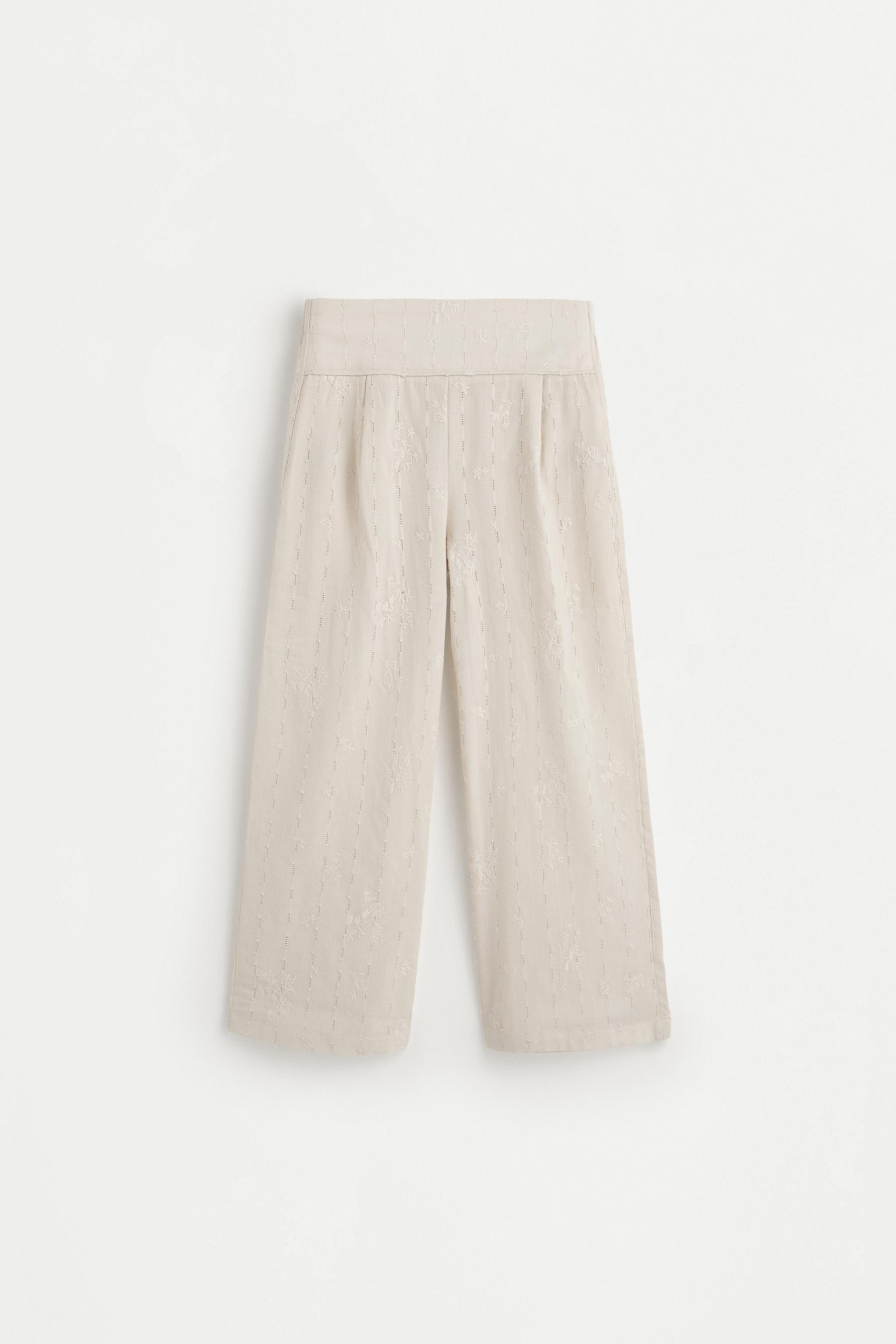Embroidered trousers — SAND