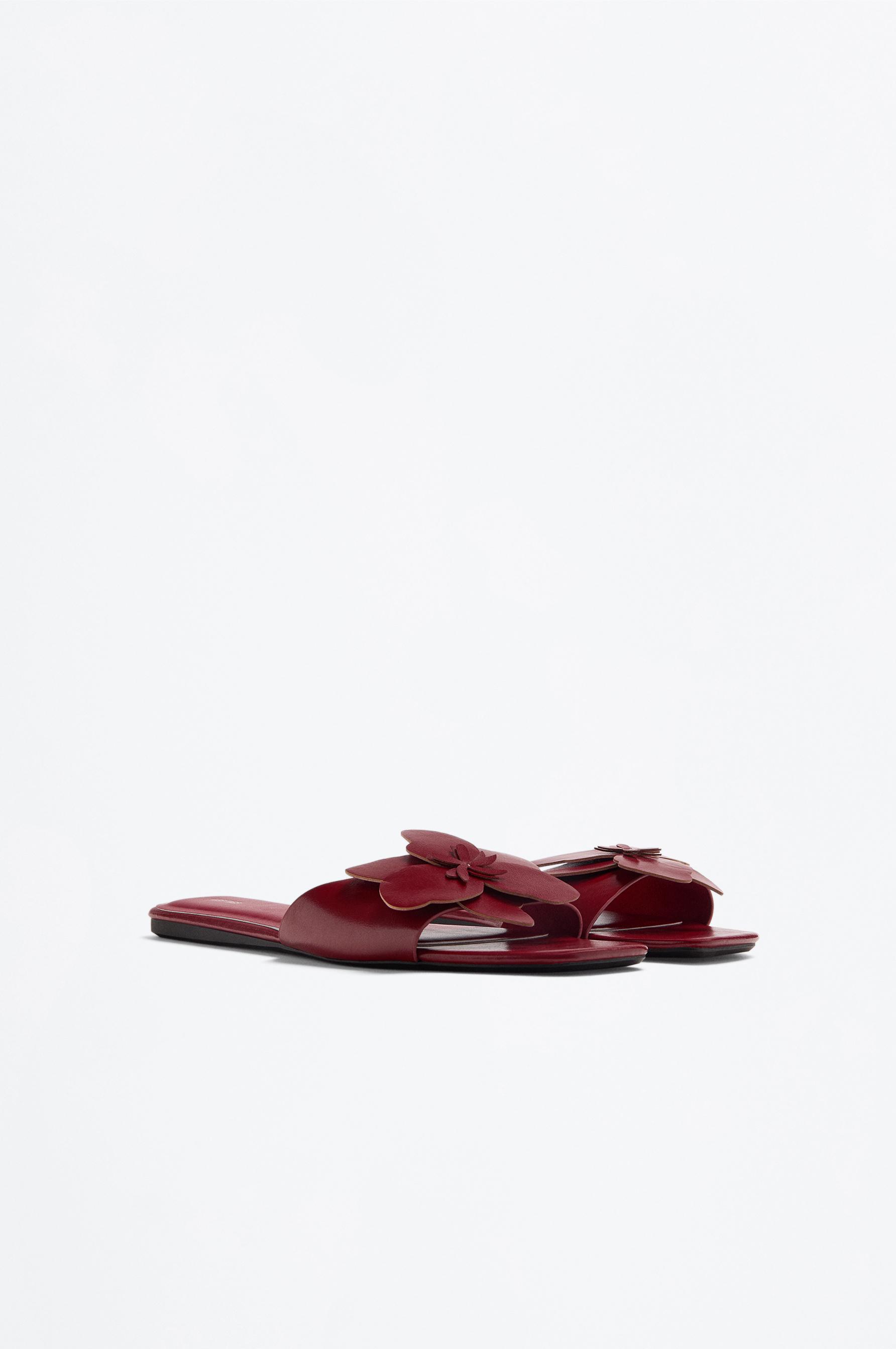 Flat slider sandals with flower detail — RED
