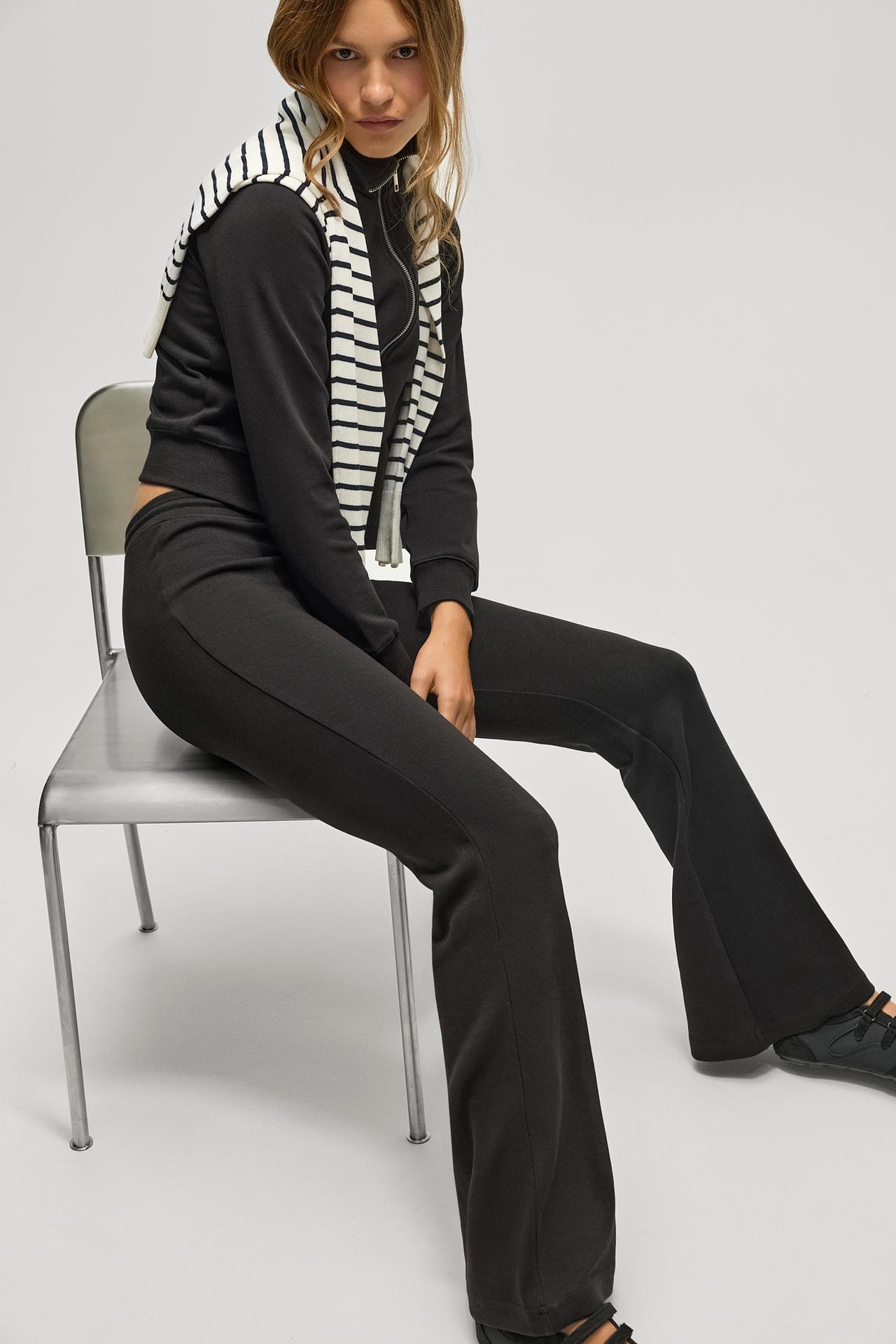Basic interlock bell bottom trousers — BLACK
