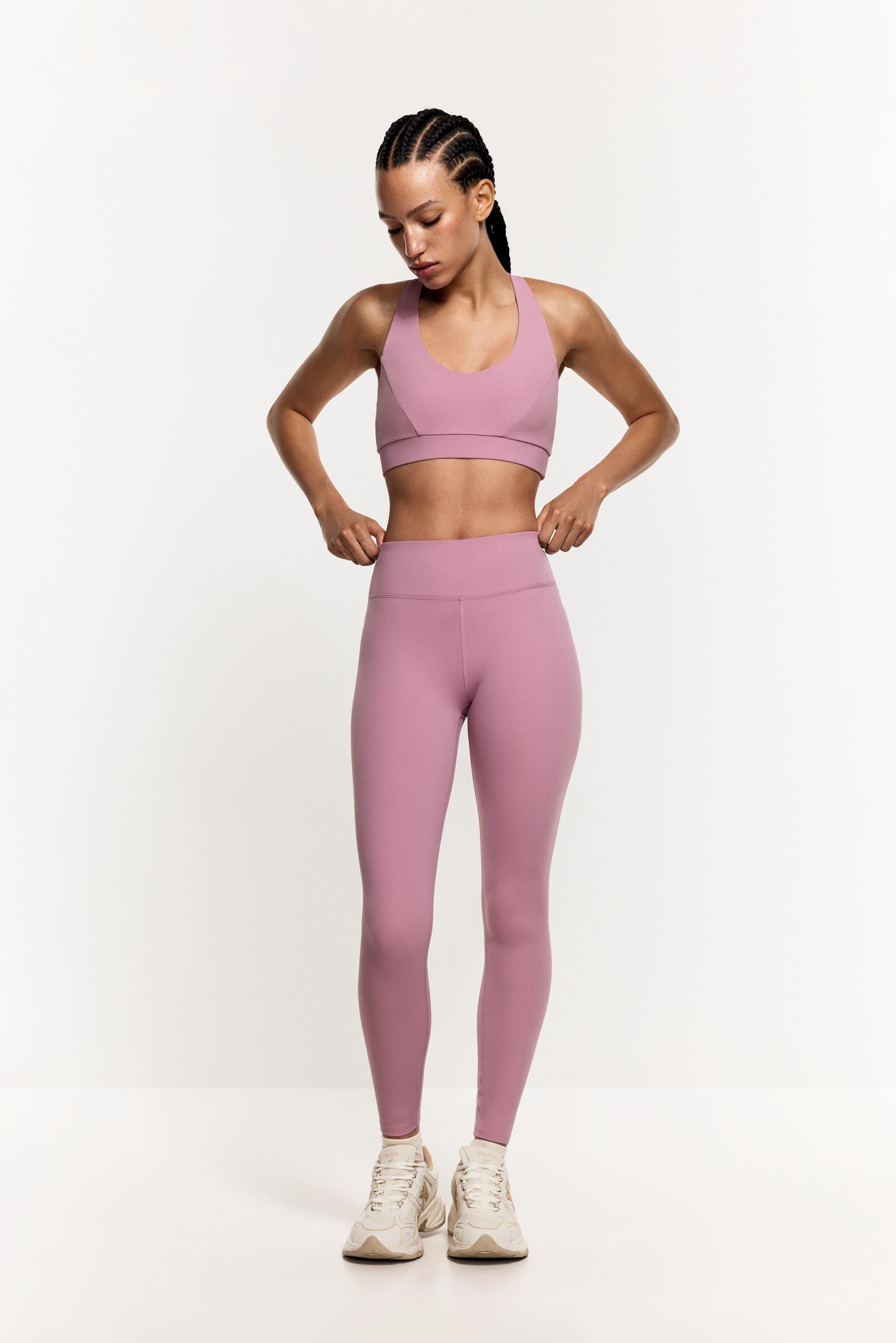 Criss-cross strap sports top — PASTEL PINK