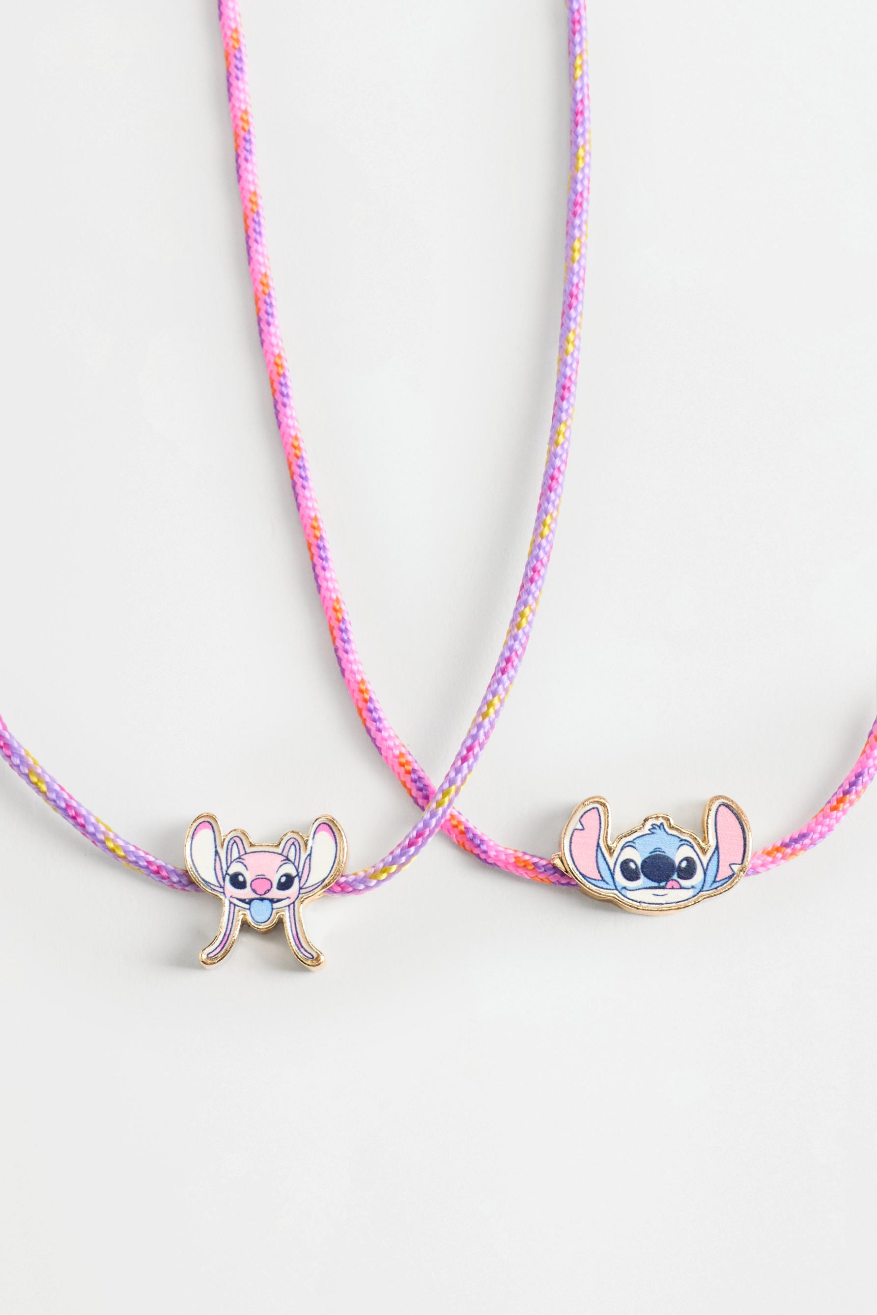Stitch and Angel ©Disney necklaces (2-pack) — PASTEL PINK