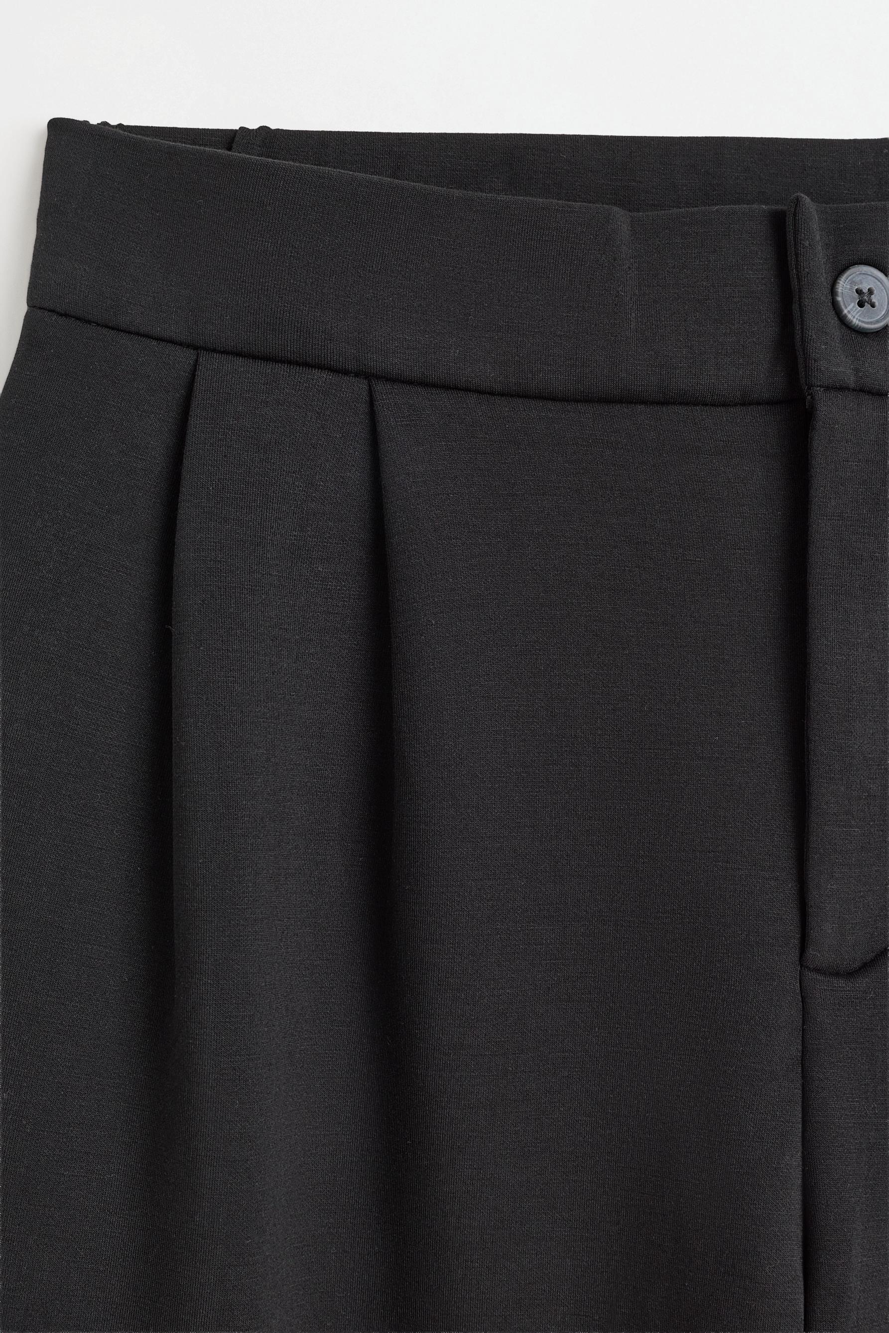 Wide-leg pleated trousers — BLACK