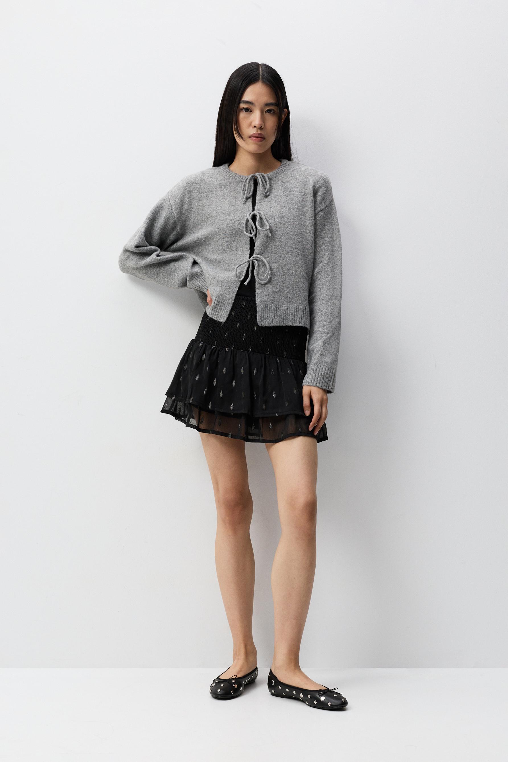 Falda volantes detalles metalizados