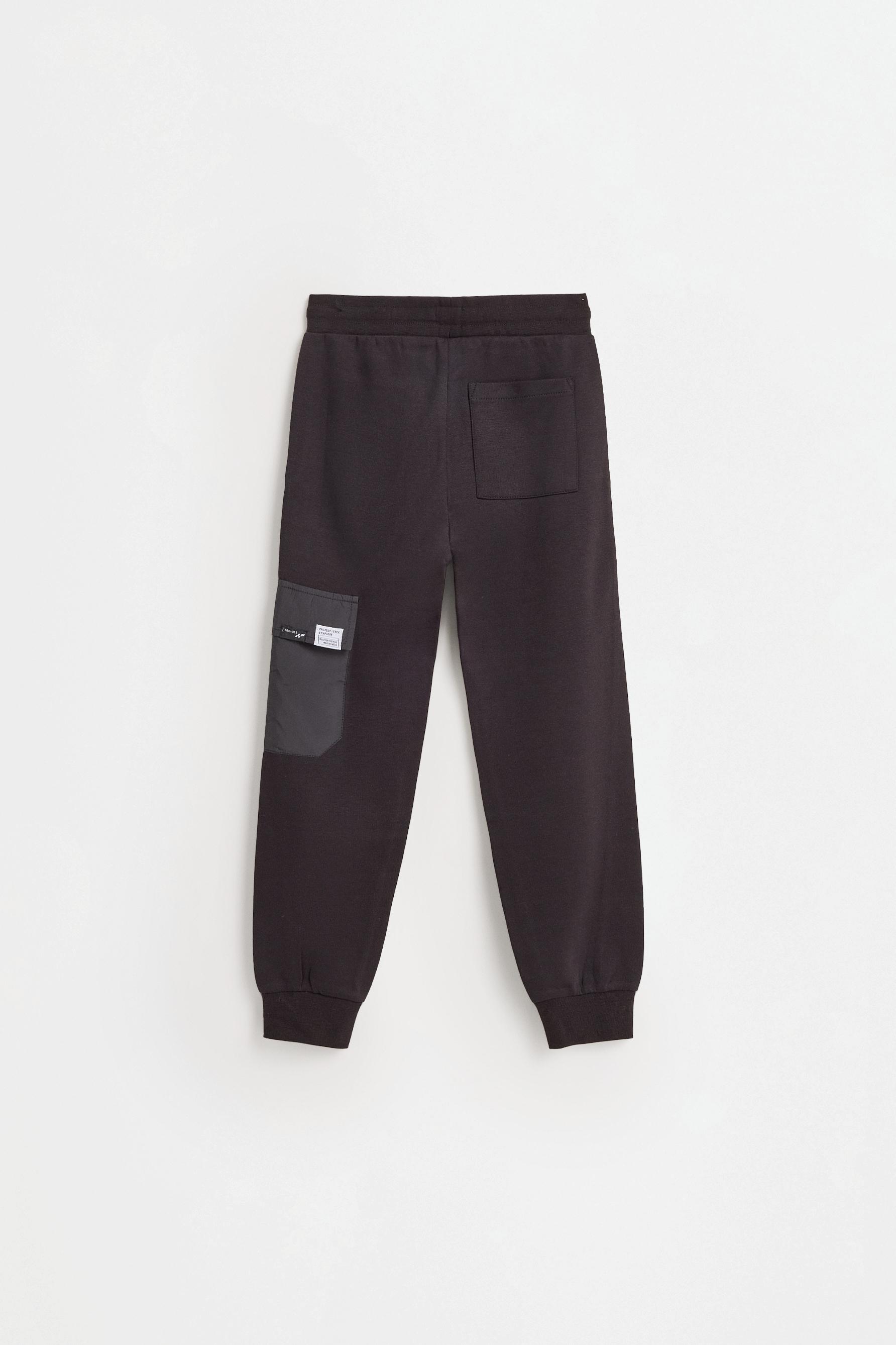 Interlock plush cargo trousers — BLACK