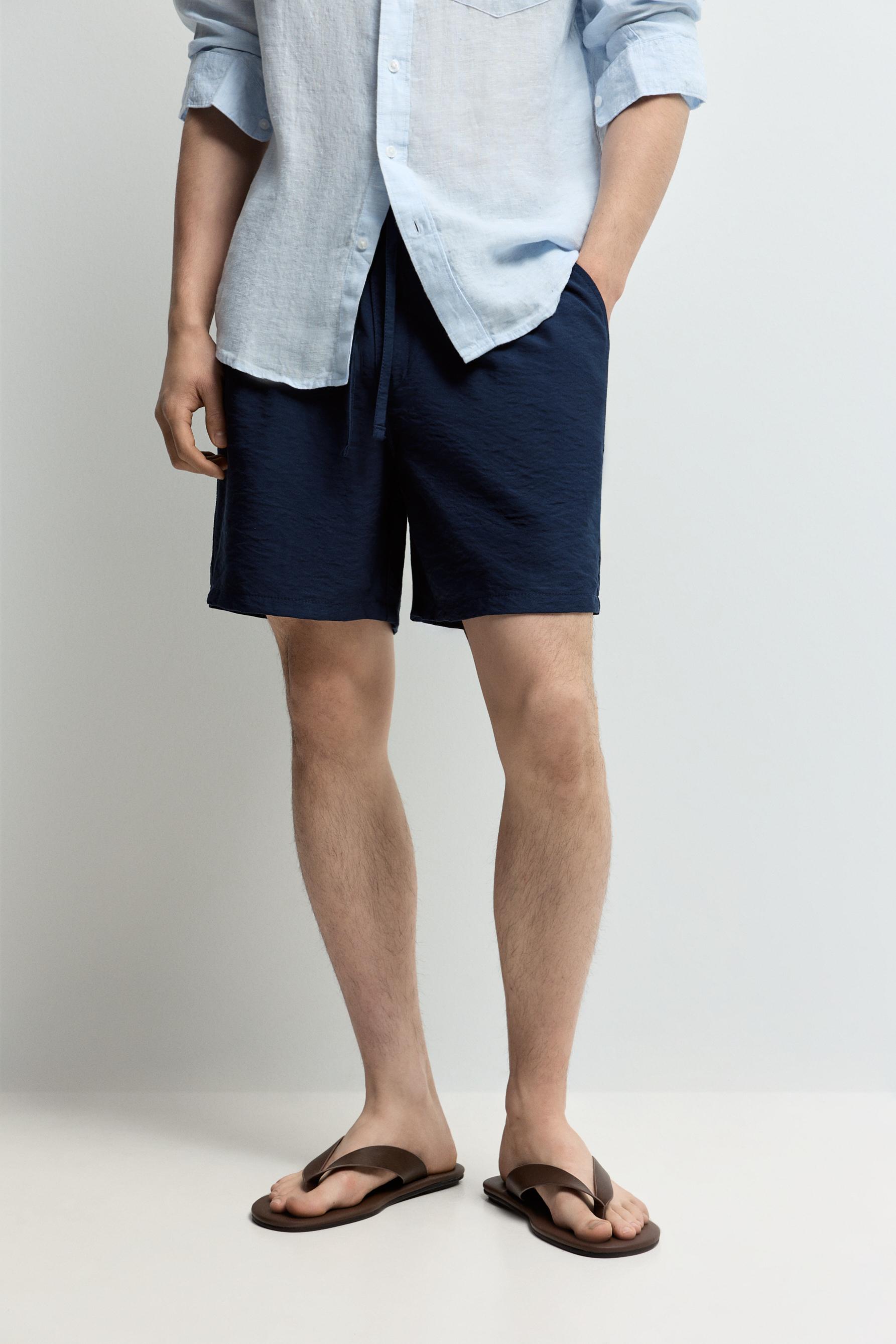 Flowing pleated Bermuda shorts — NAVY