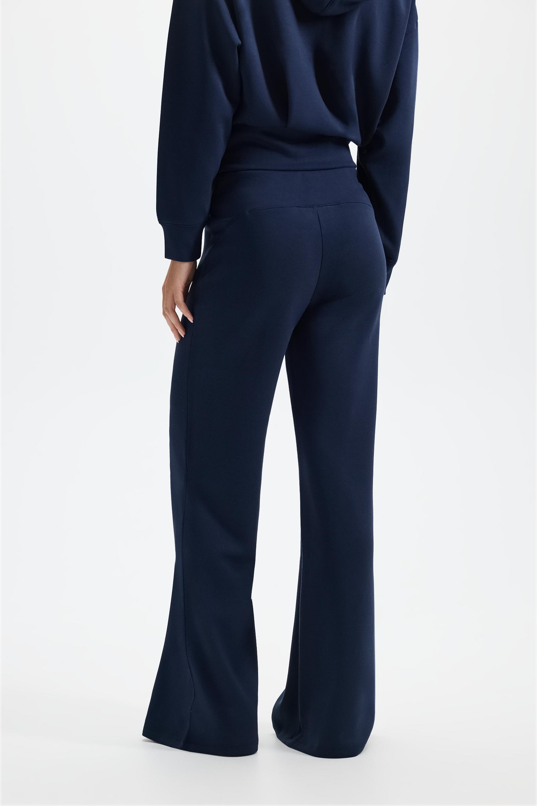 Flowing flared tracksuit trousers — DARK BLUE