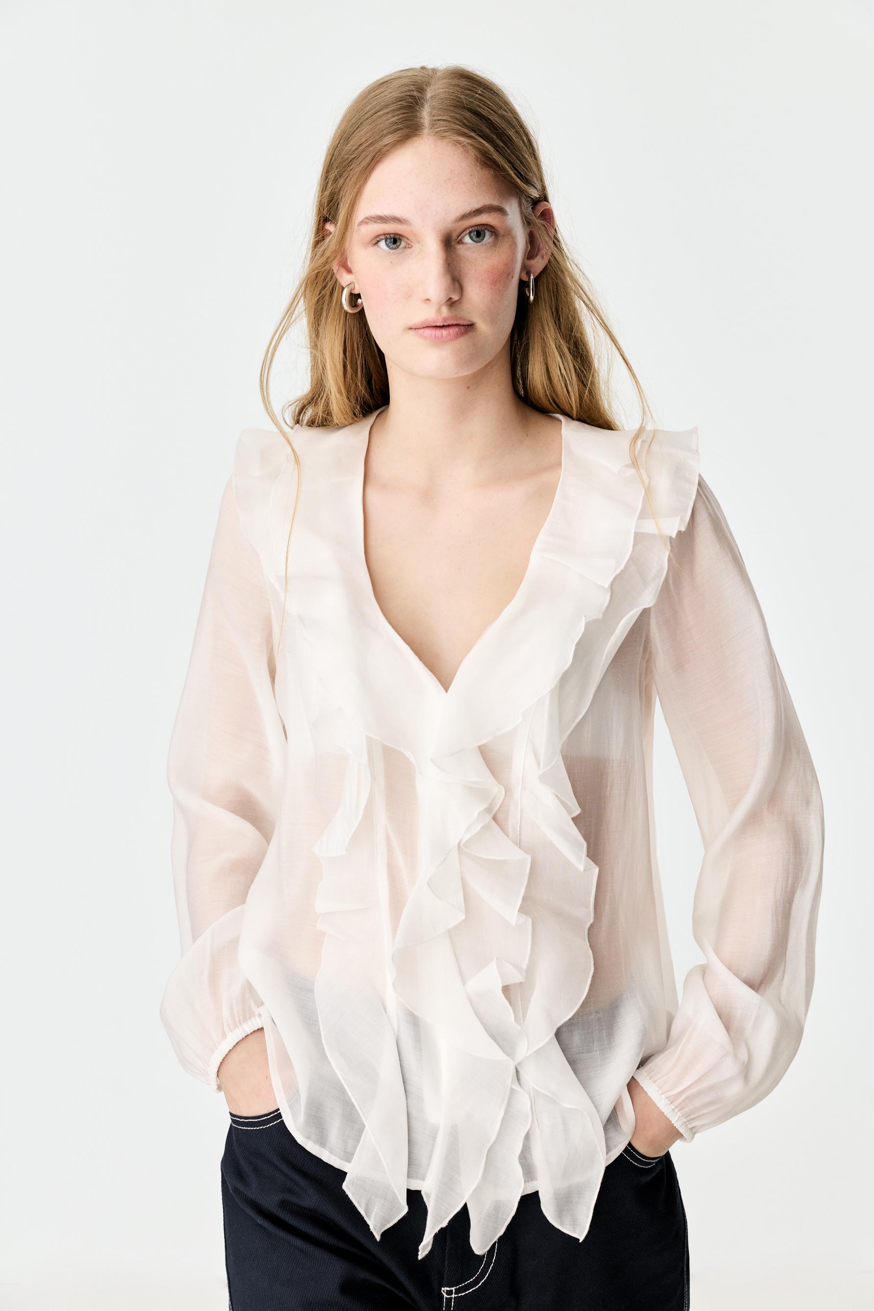 Camisa volantes semitransparente