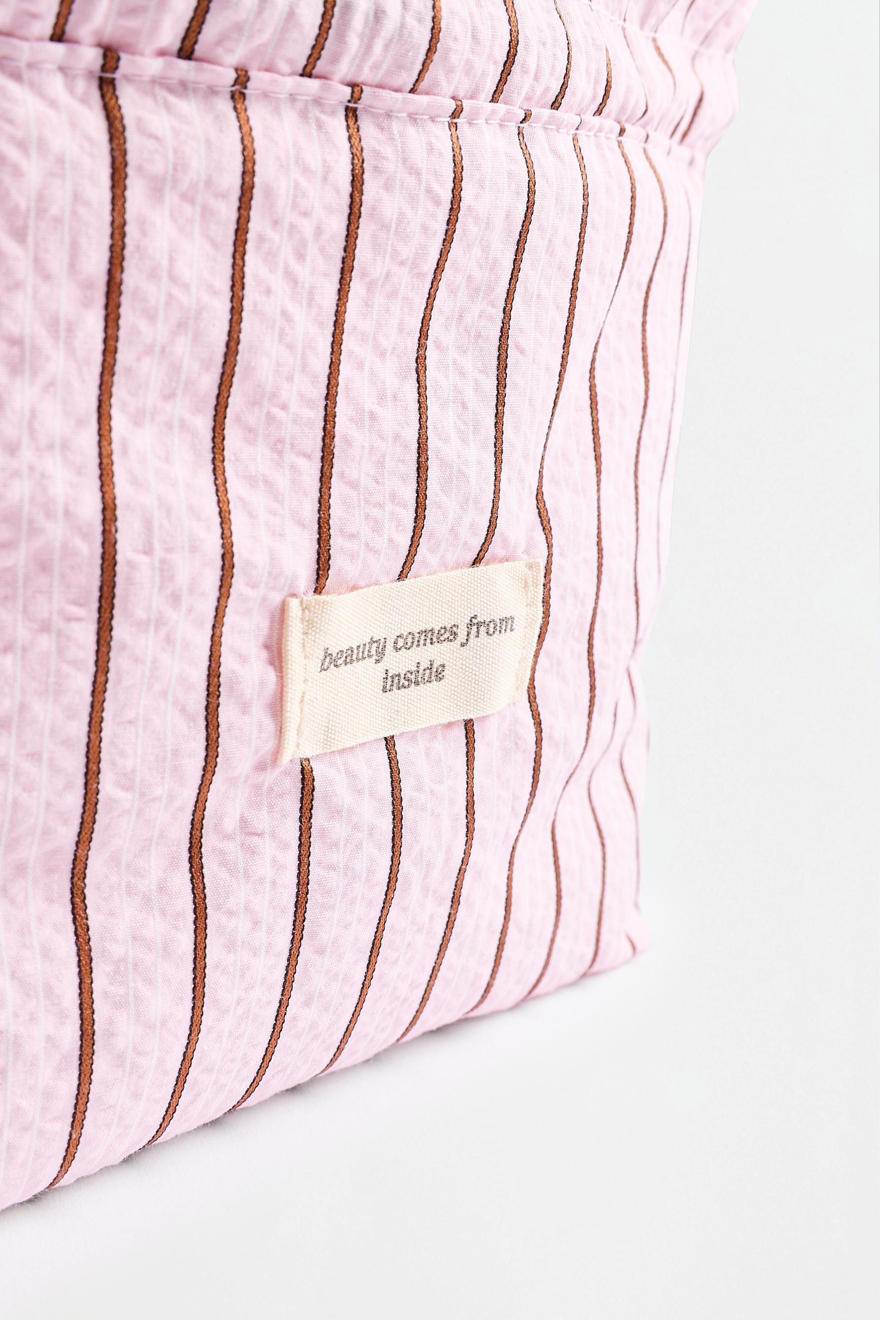 Small striped toiletry bag — ROSE PINK