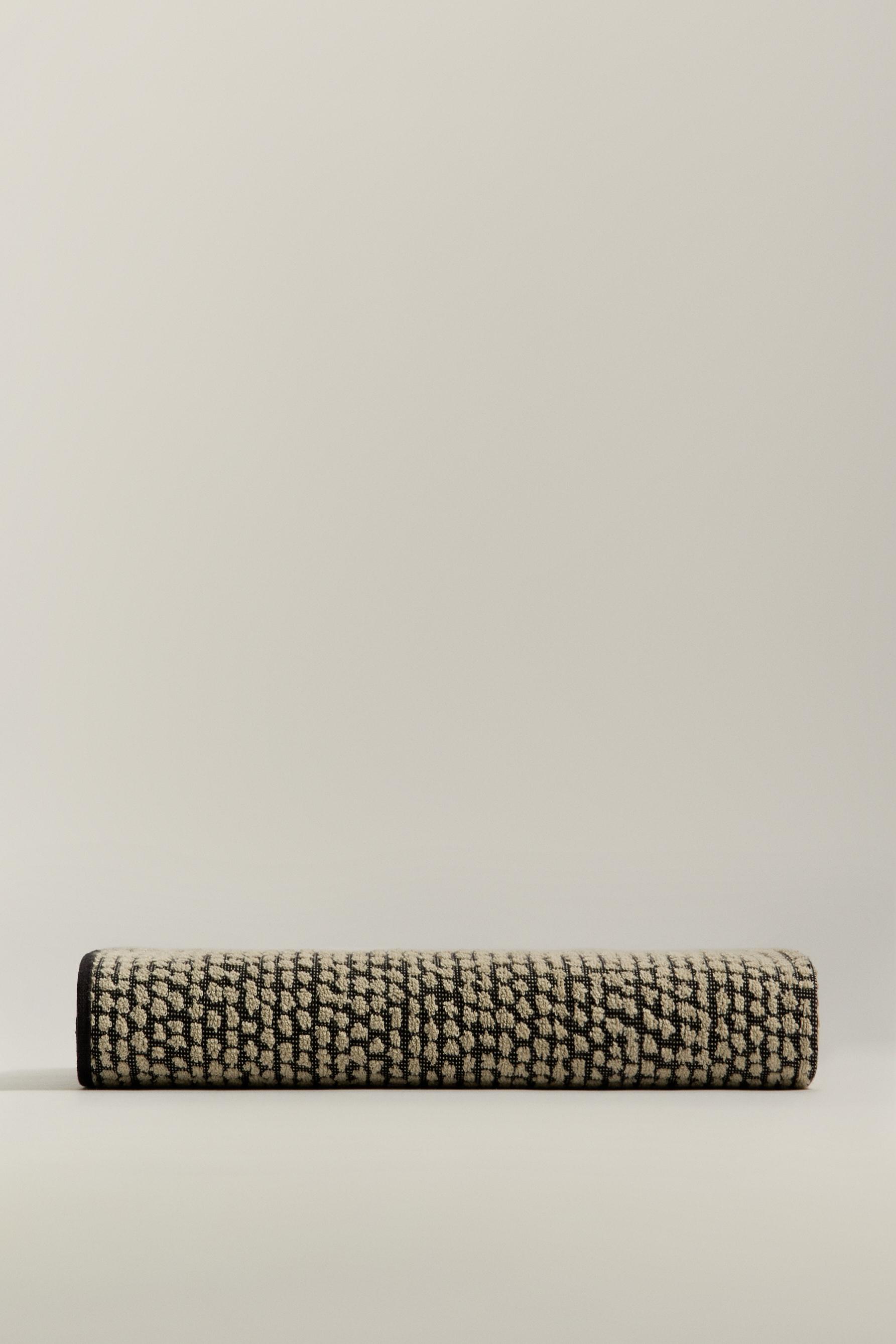 Toalla de baño textura 140 x 70 cm