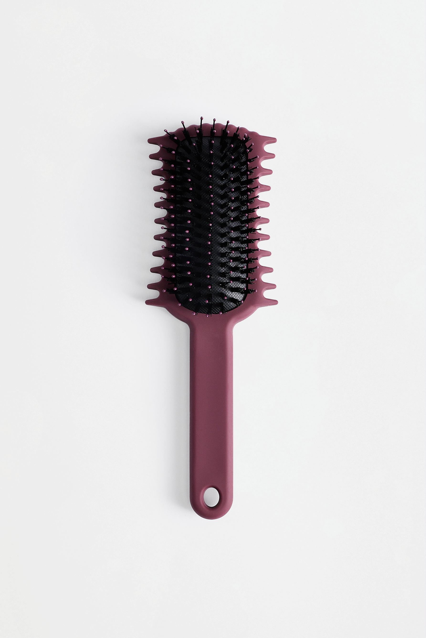 Cepillo pelo rizado