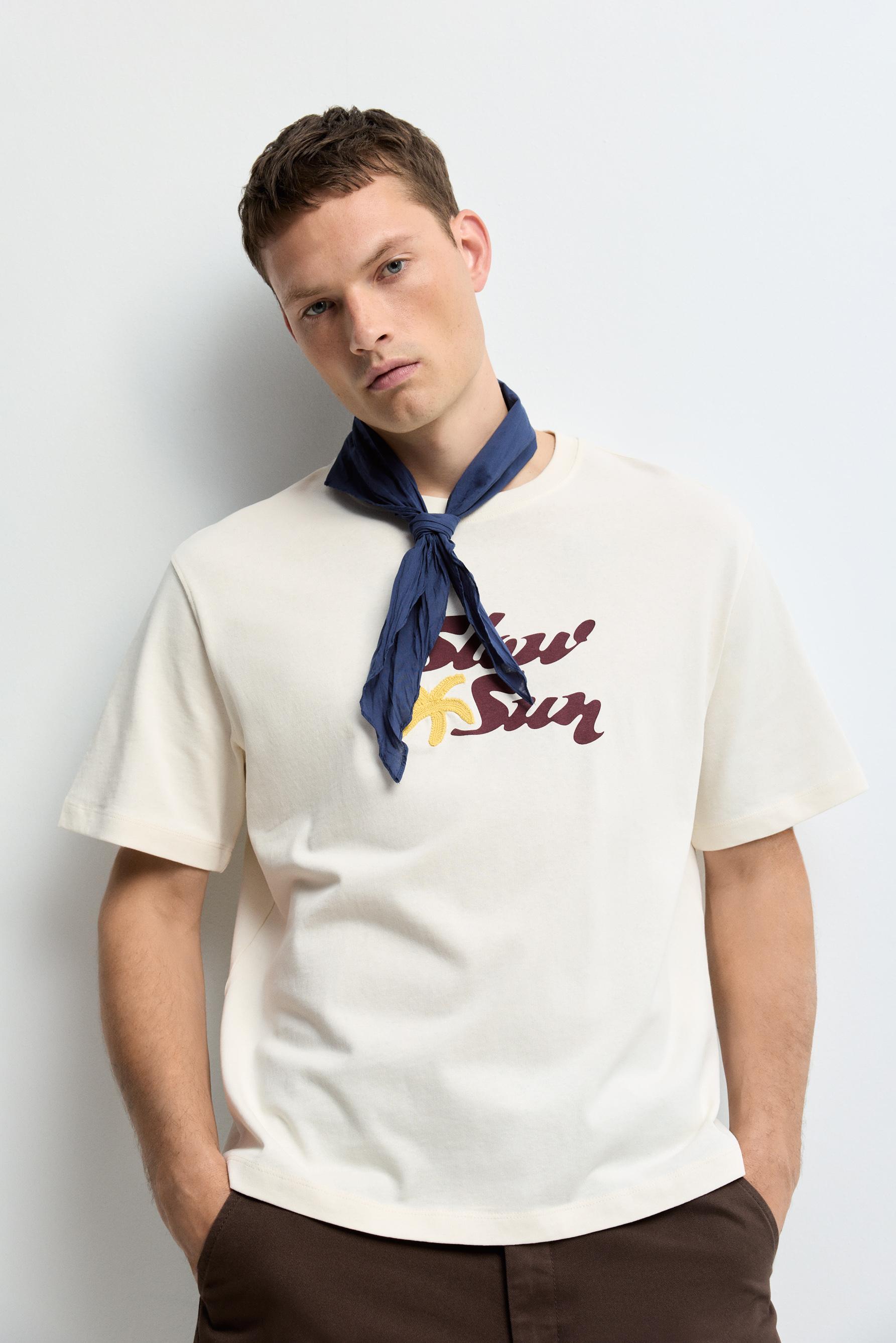 Embroidered text T-shirt — BUTTER