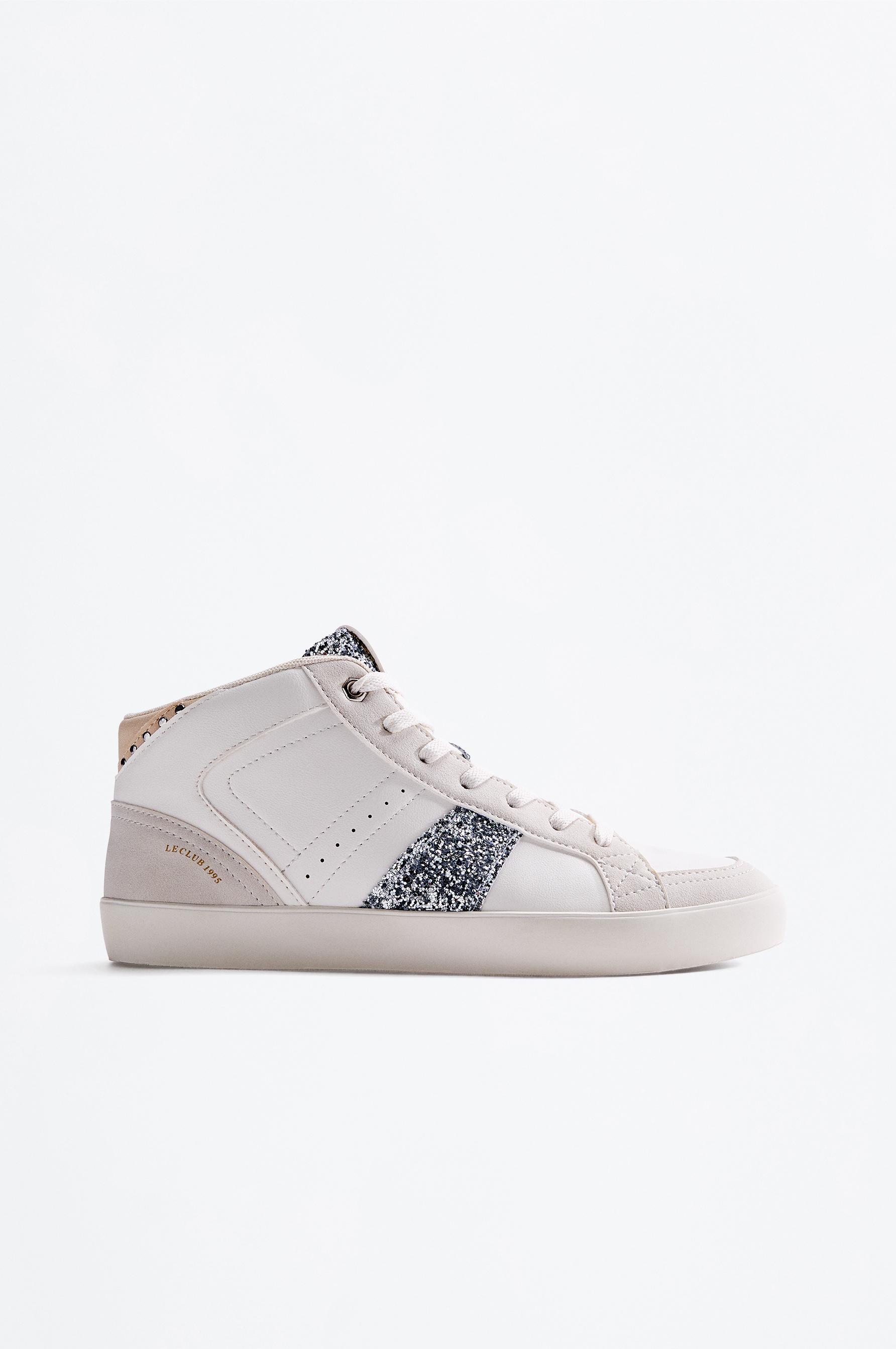 Zapatilla botín brillos