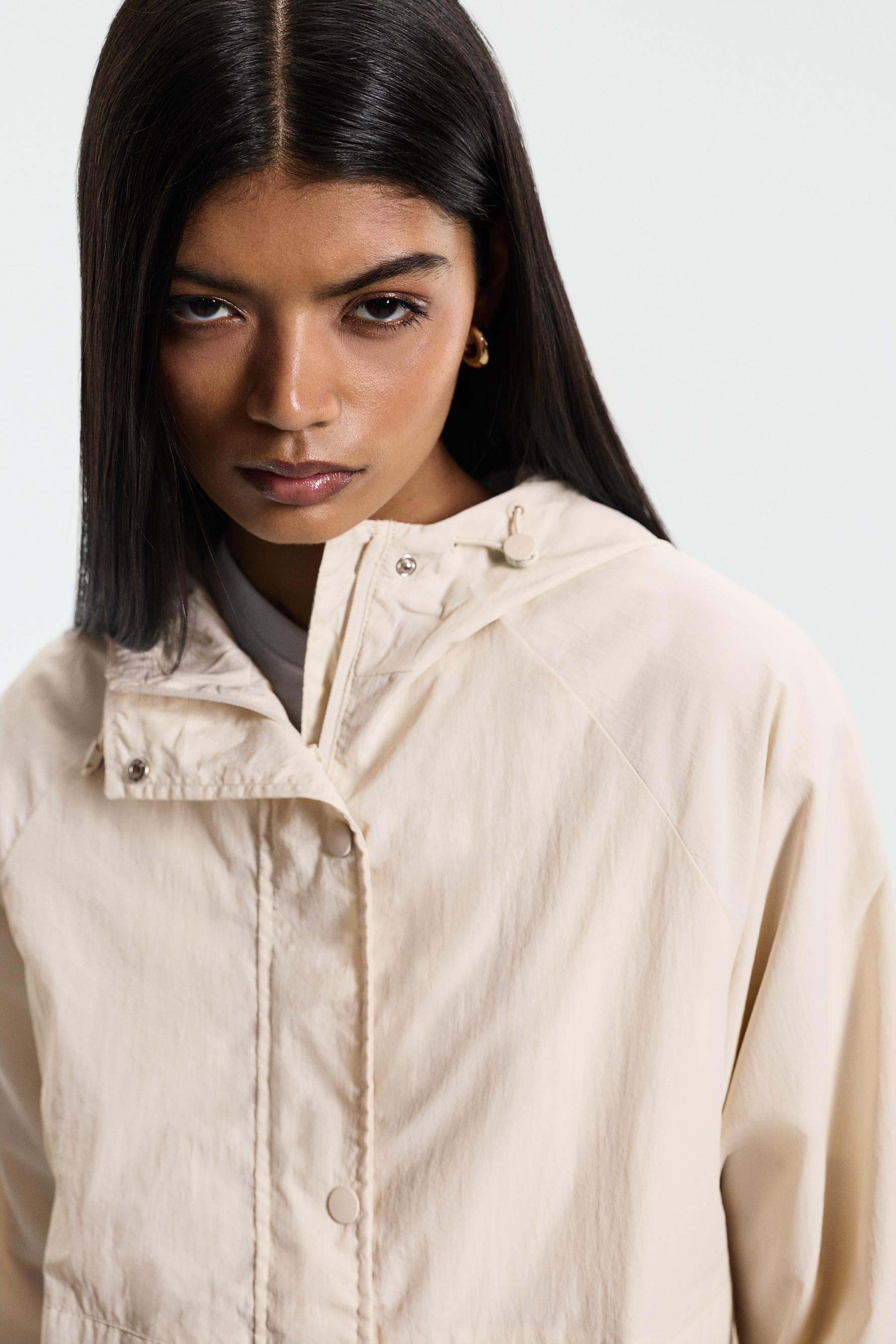 Cropped hooded windbreaker — ECRU