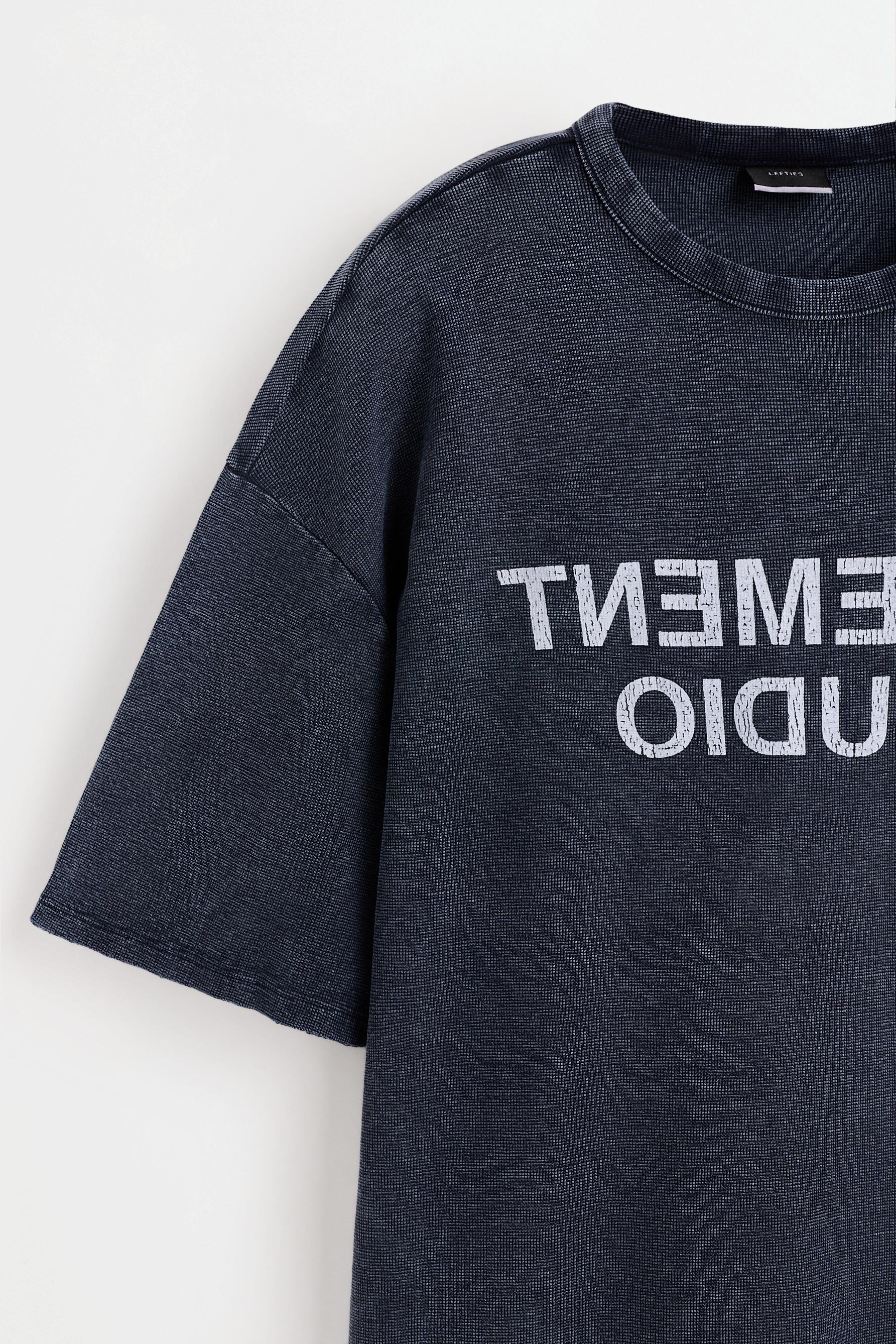 Faded-effect slogan T-shirt — FADED NAVY