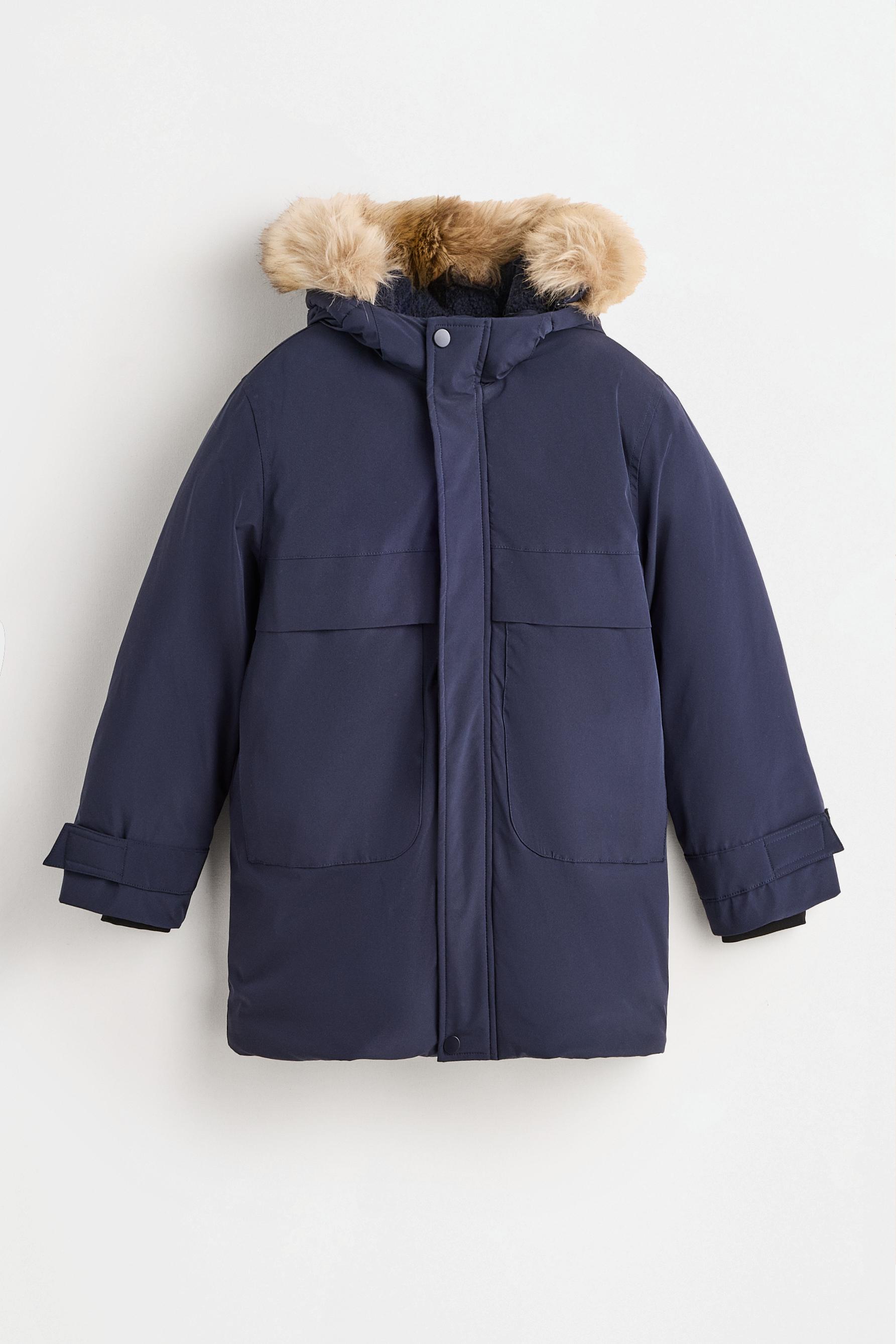 Parka con capucha de pelo