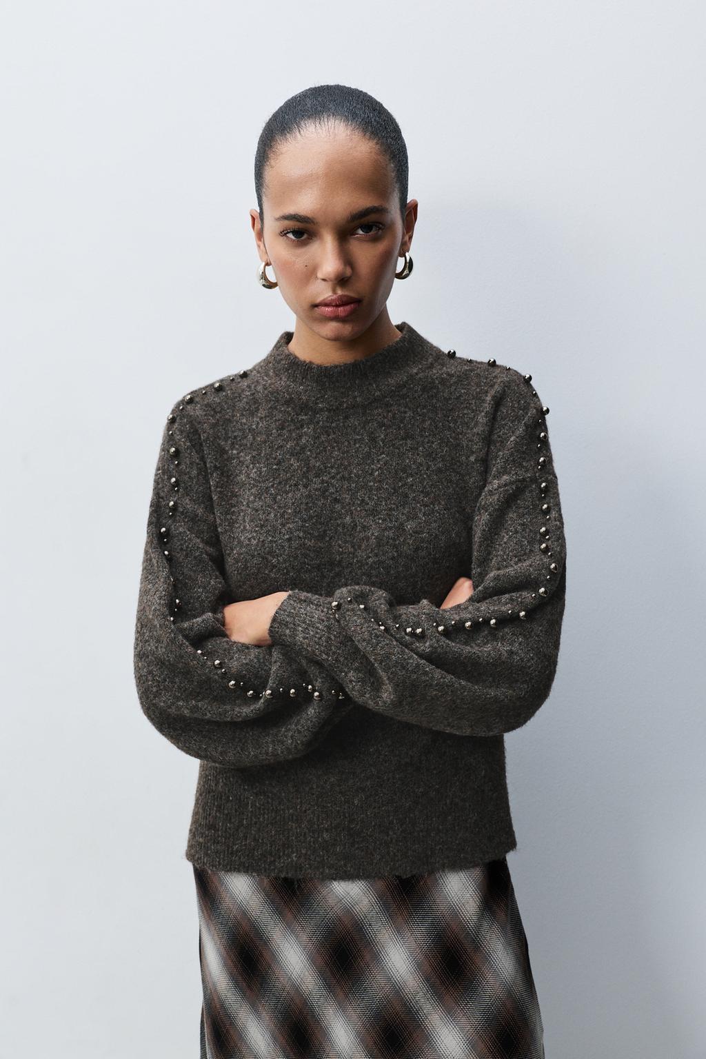 Appliqué sleeve sweater