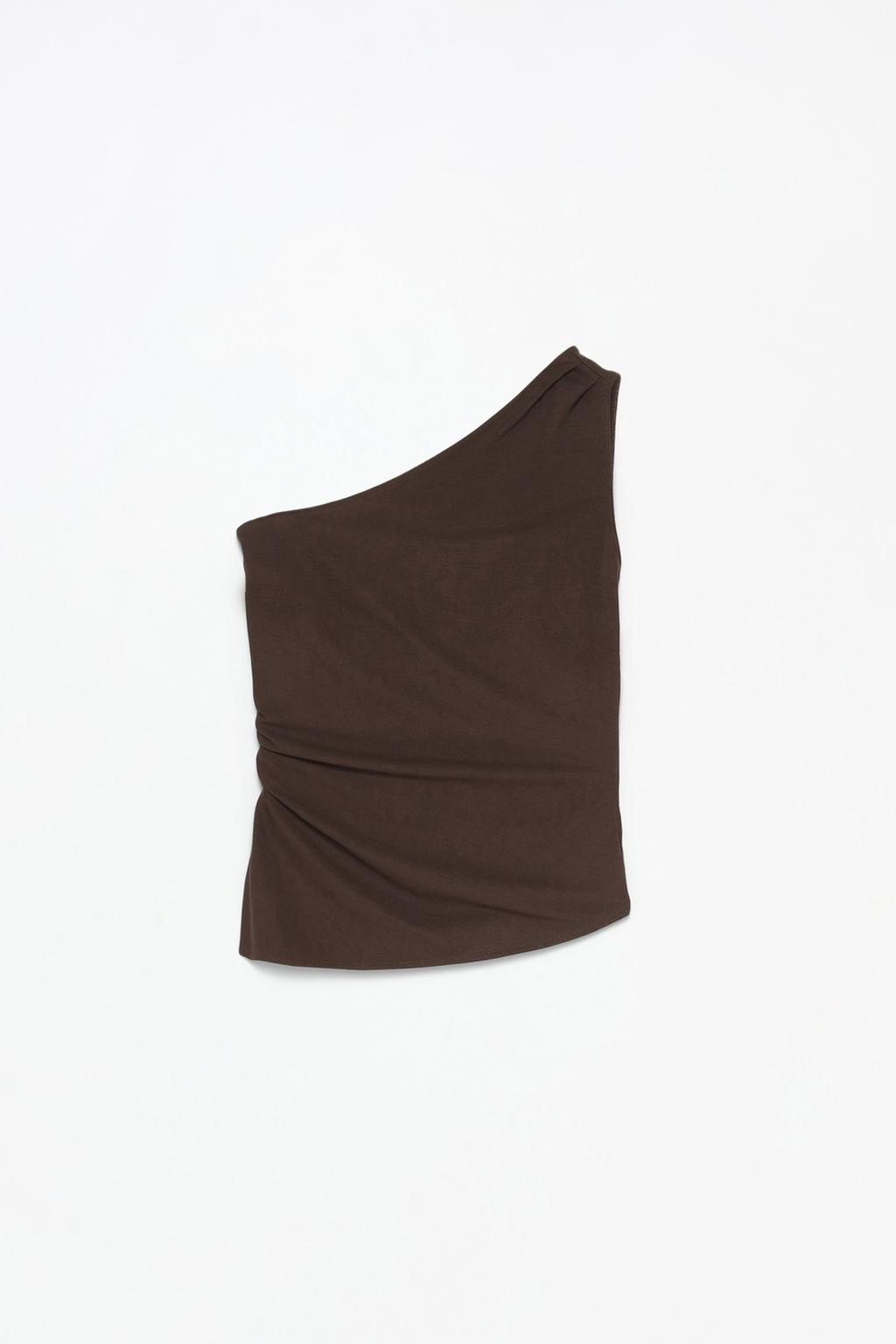 Asymmetric rustic top