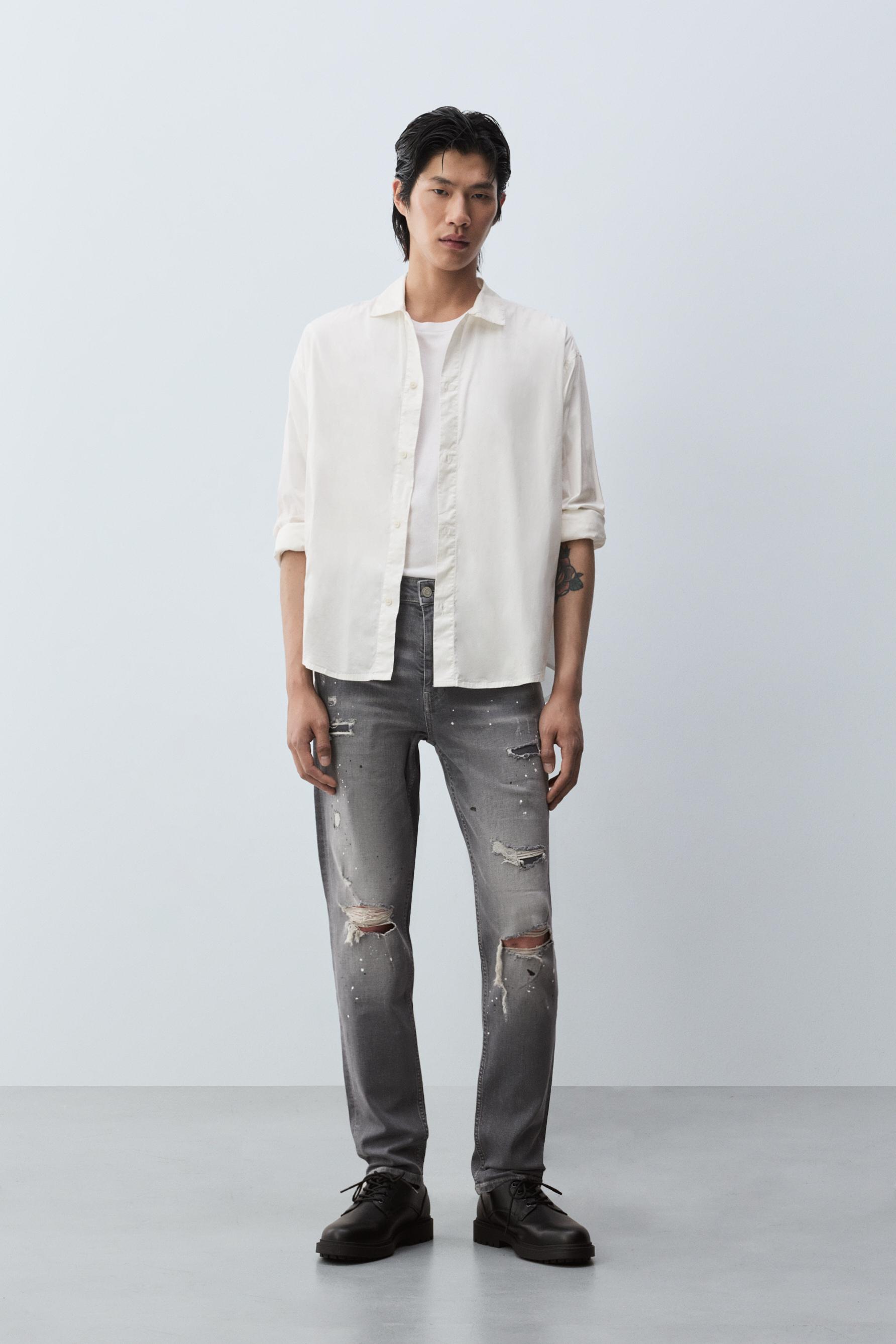 Jeans skinny rotos efecto moteado