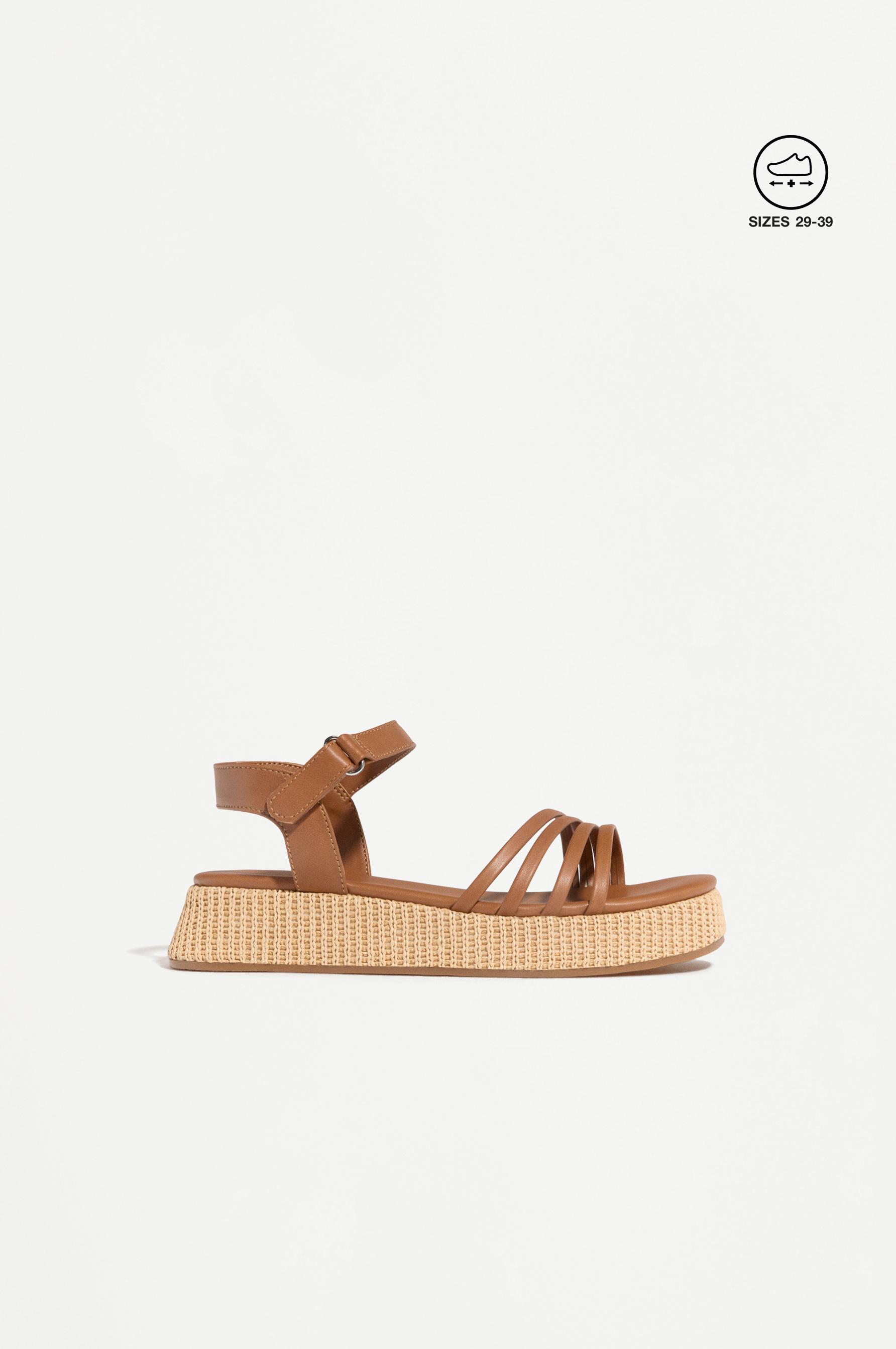 STRAPPY PLATFORM SANDAL — LEATHER