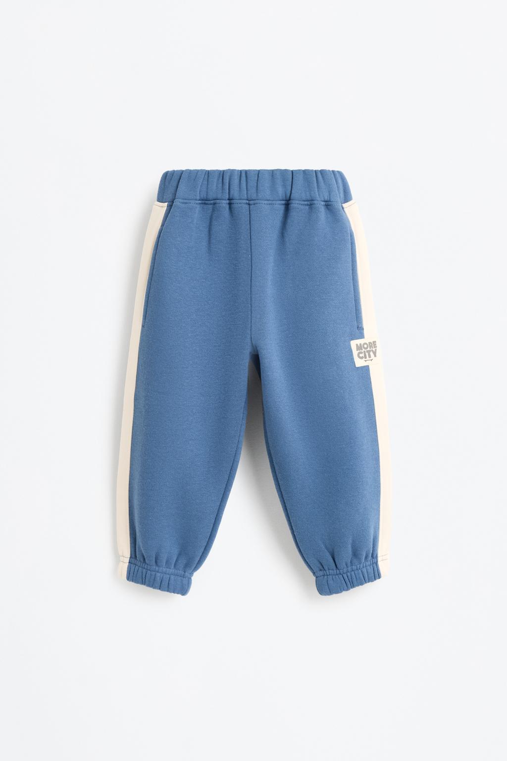 Plush trousers with side stripes