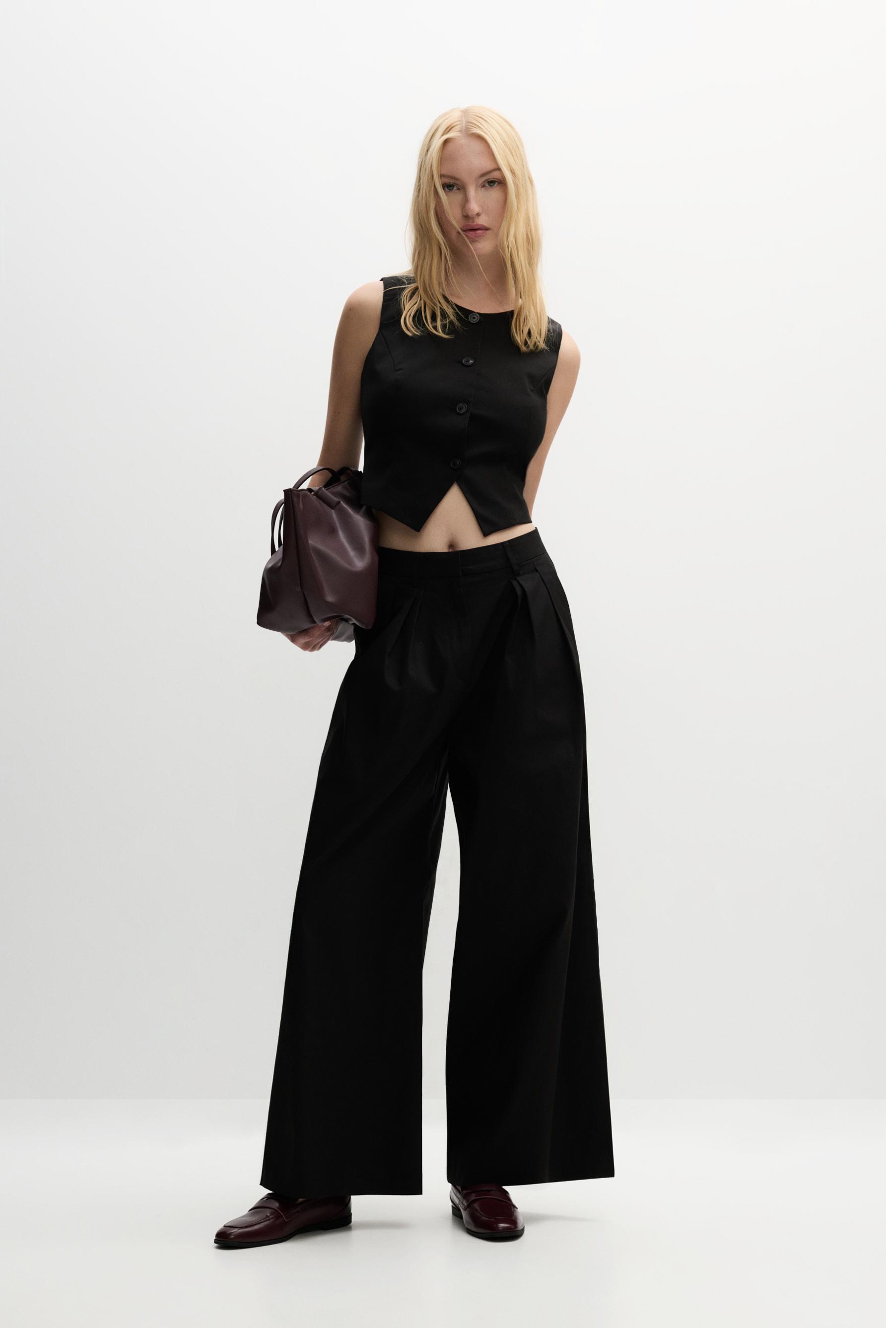 Pantalón wide pliegues