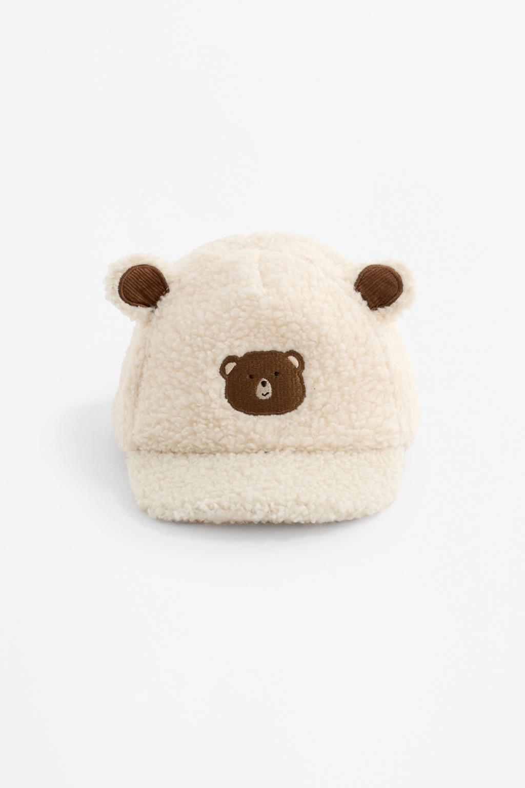 Embroidered shearling ear cap