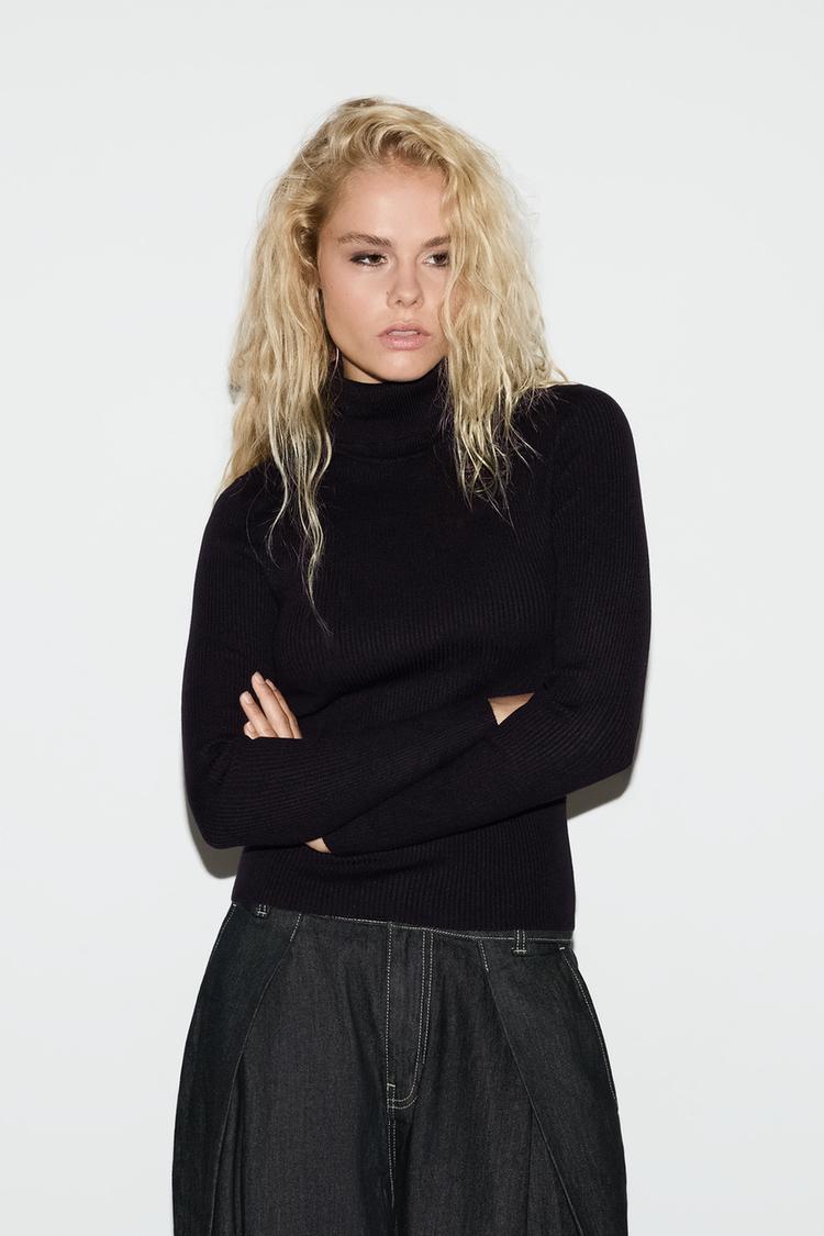 Ribbed high-neck sweater — BLACK