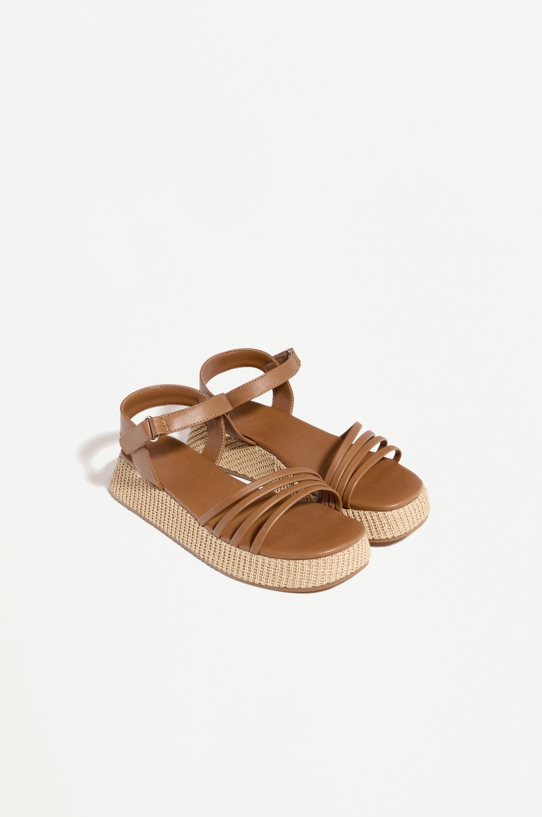 STRAPPY PLATFORM SANDAL — LEATHER