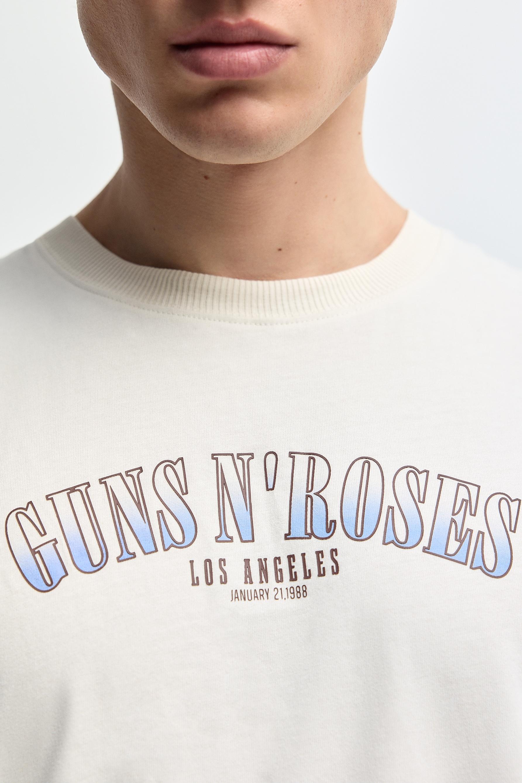 Guns N' Roses ©Universal Sleeveless T-shirt — OFF WHITE