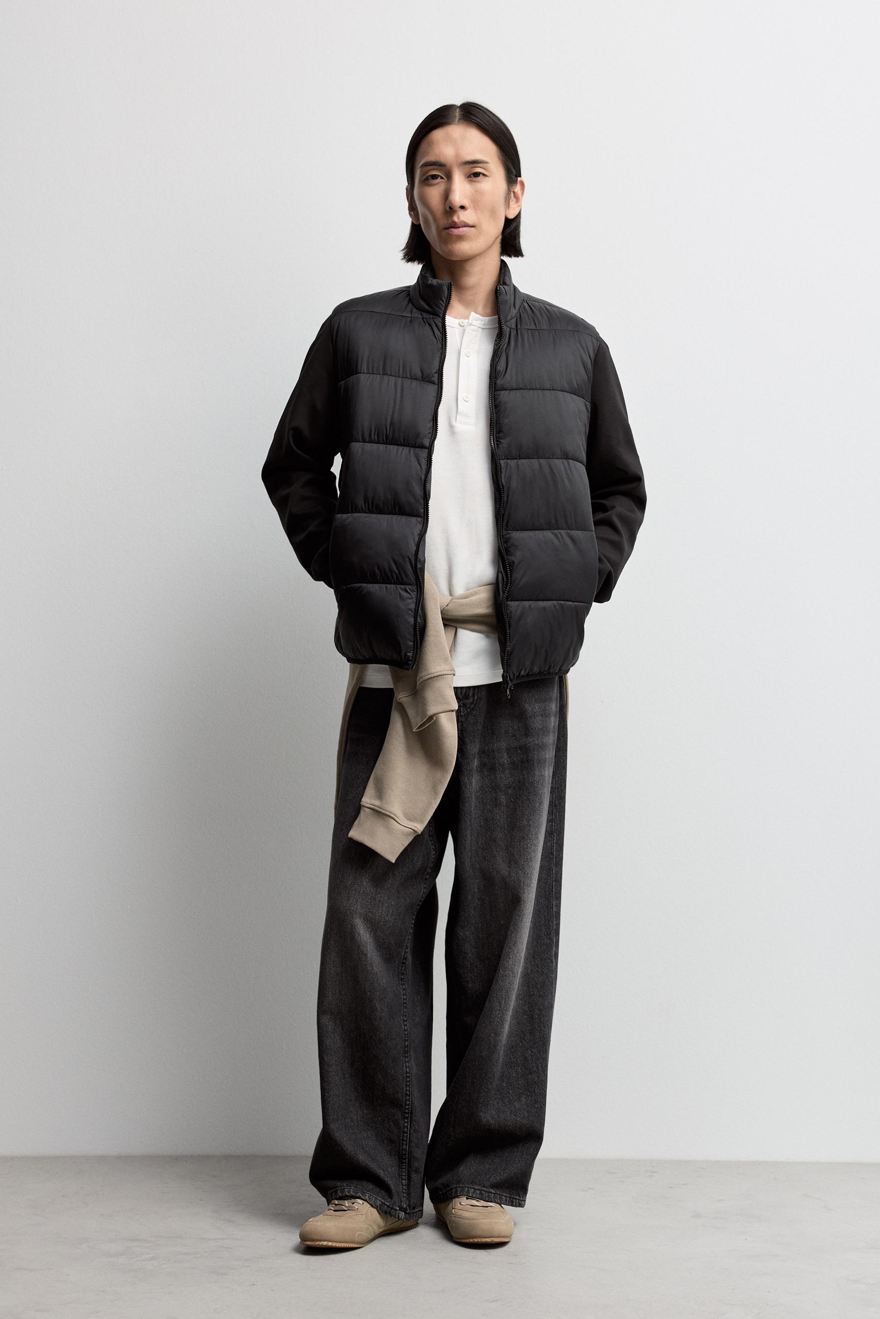 Quilted jacket with interlock sleeves — BLACK