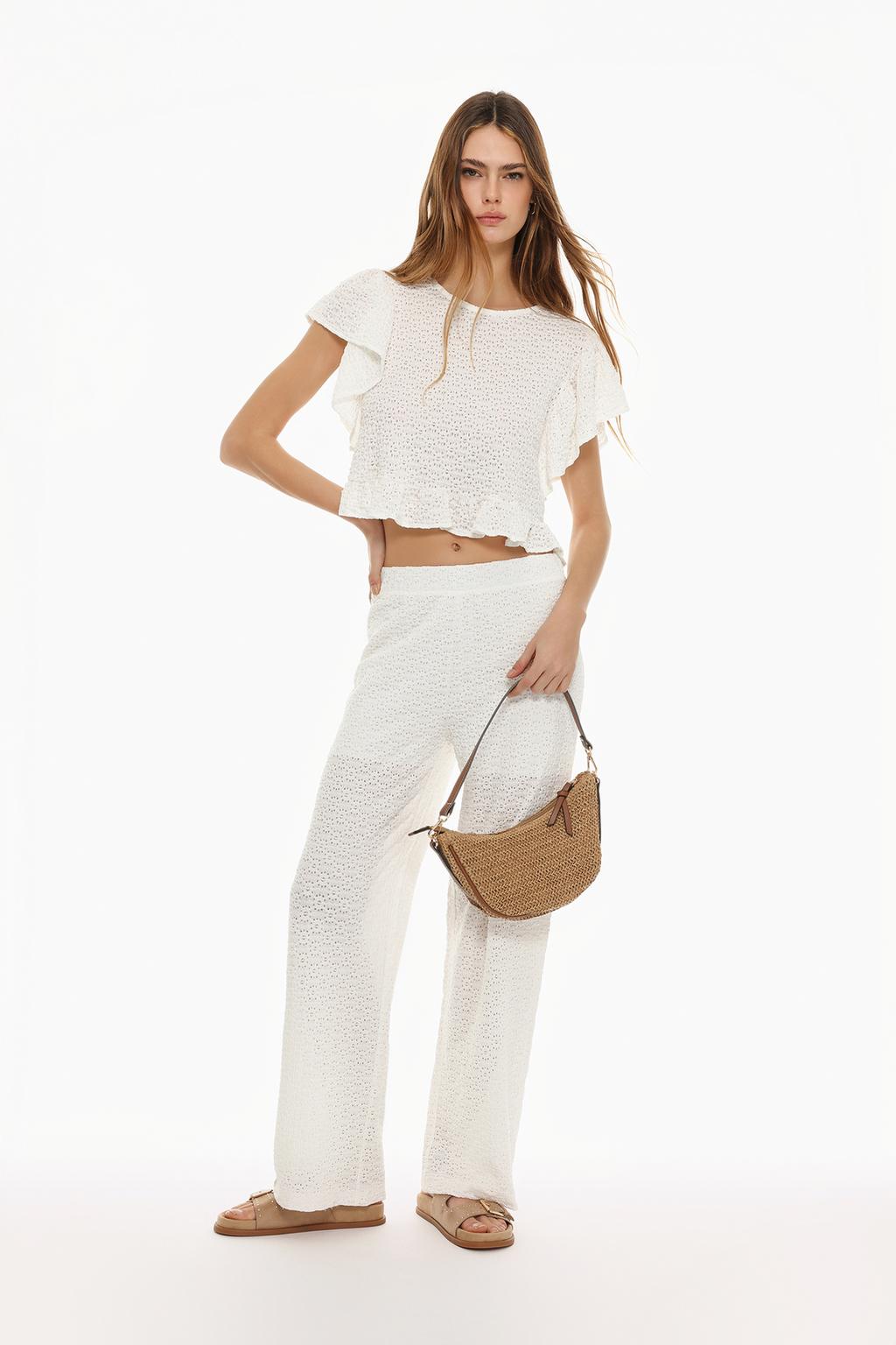 Open knit trousers