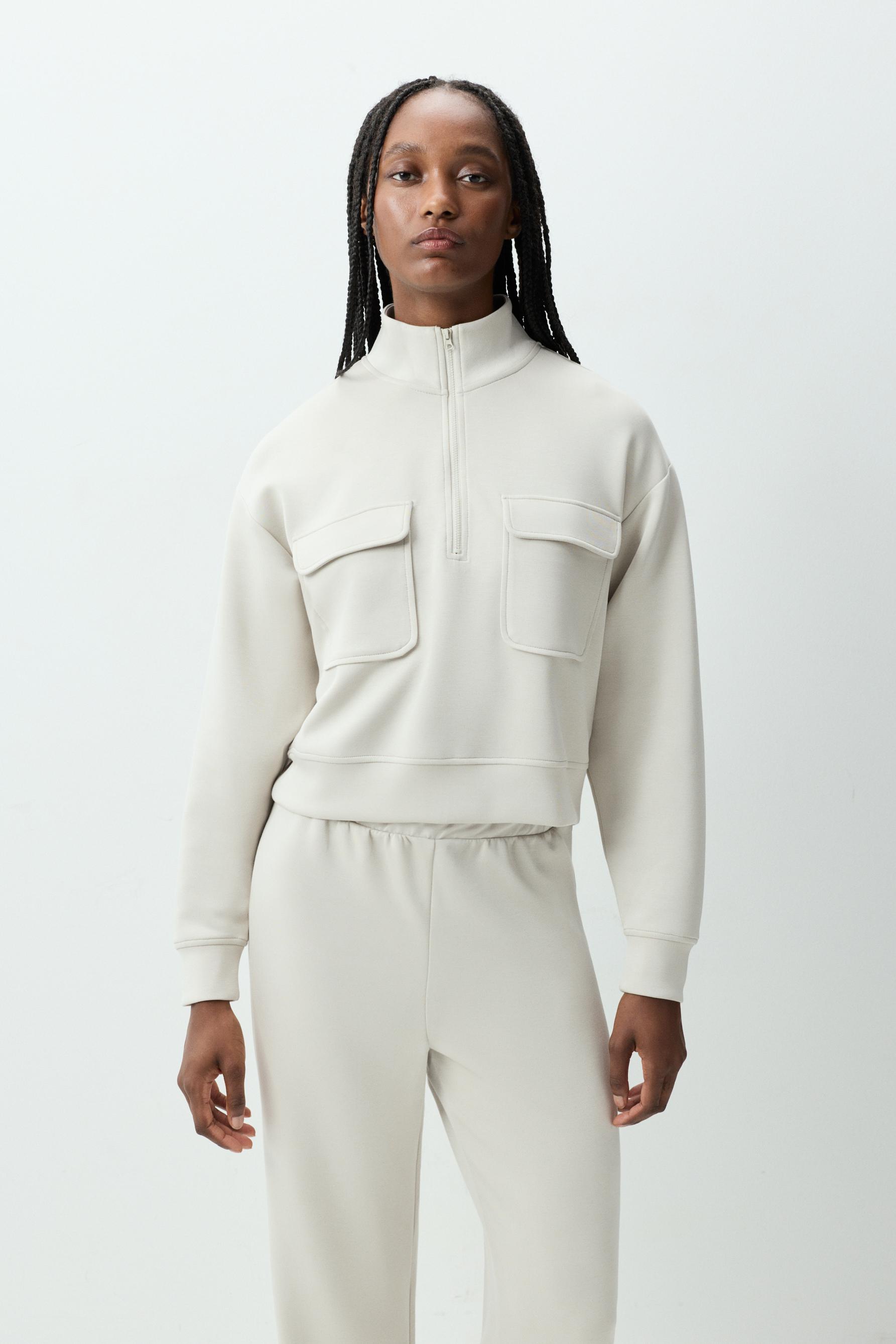 Sudadera deportiva bolsillos