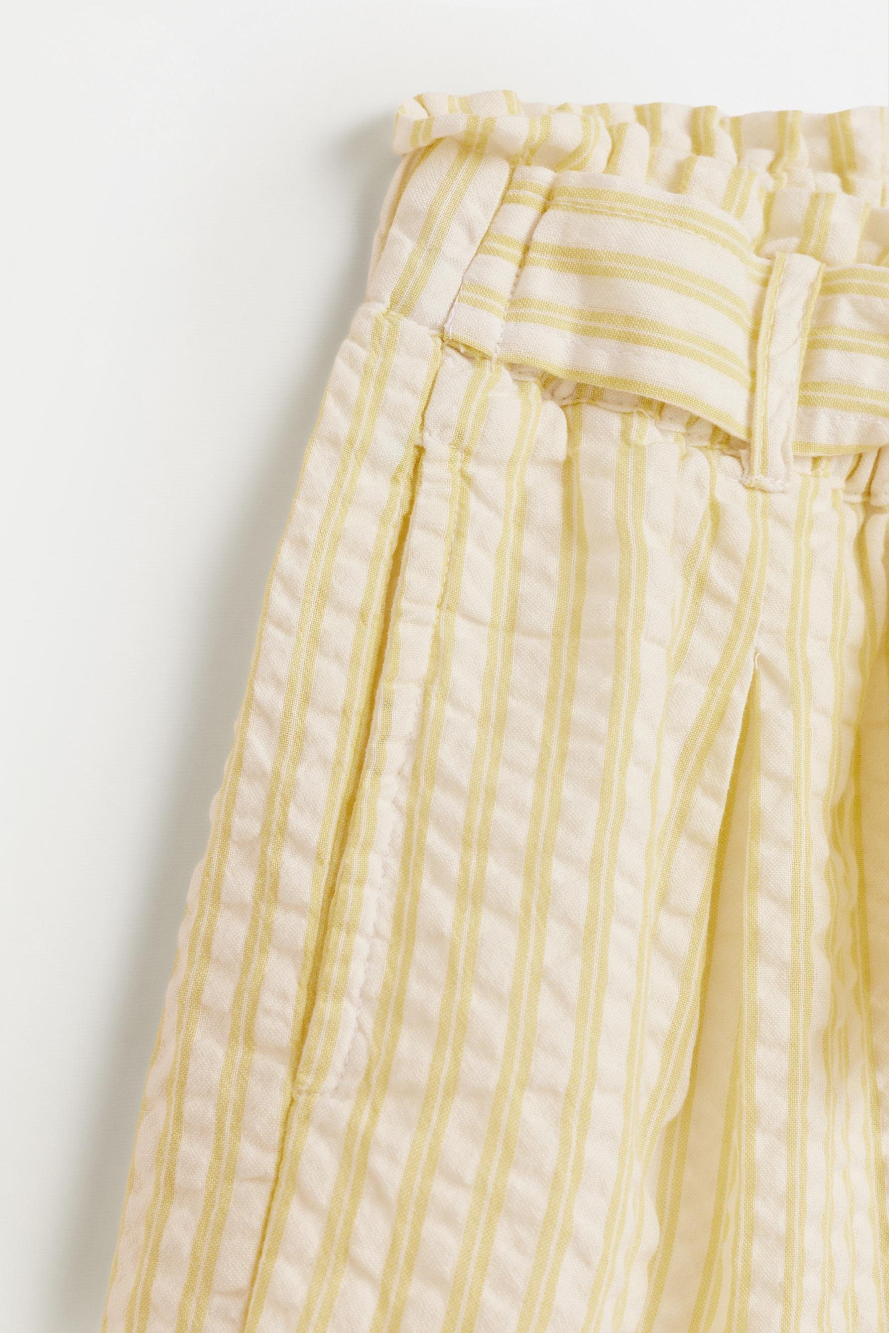Striped seersucker shorts — YELLOW
