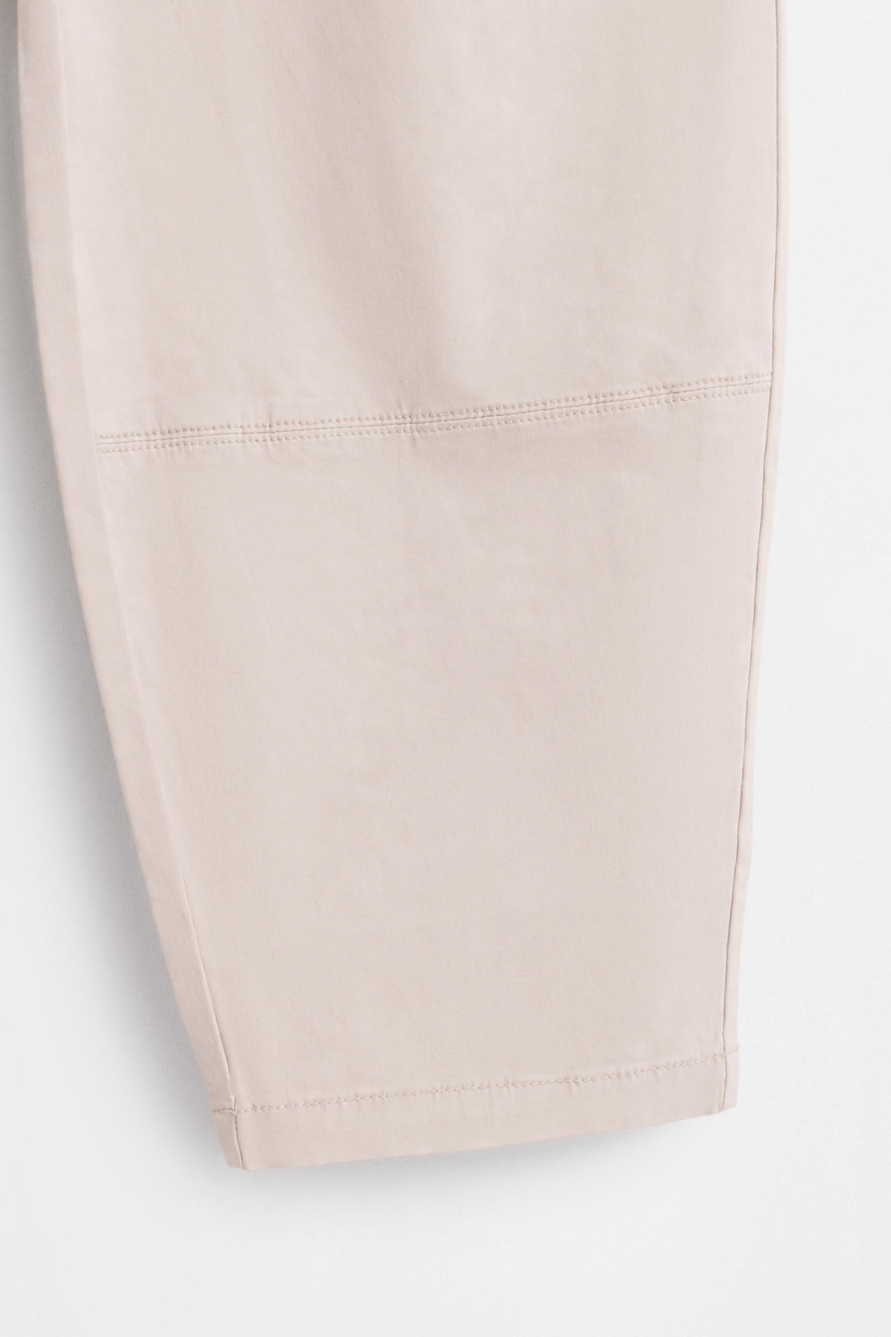 Balloon fit trousers with pleats — SAND