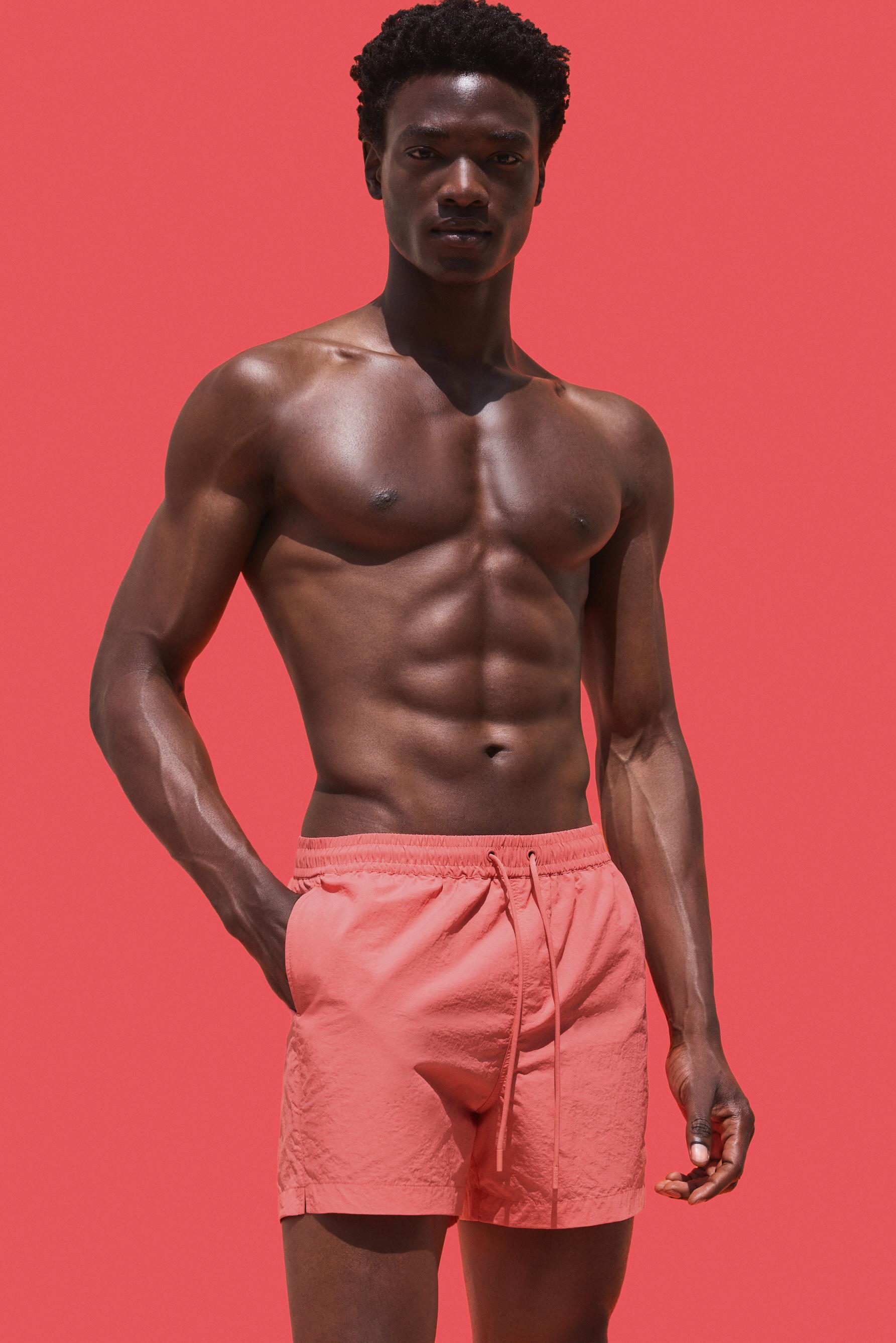 Coloro x Lefties straight swim trunks — CORAL RED