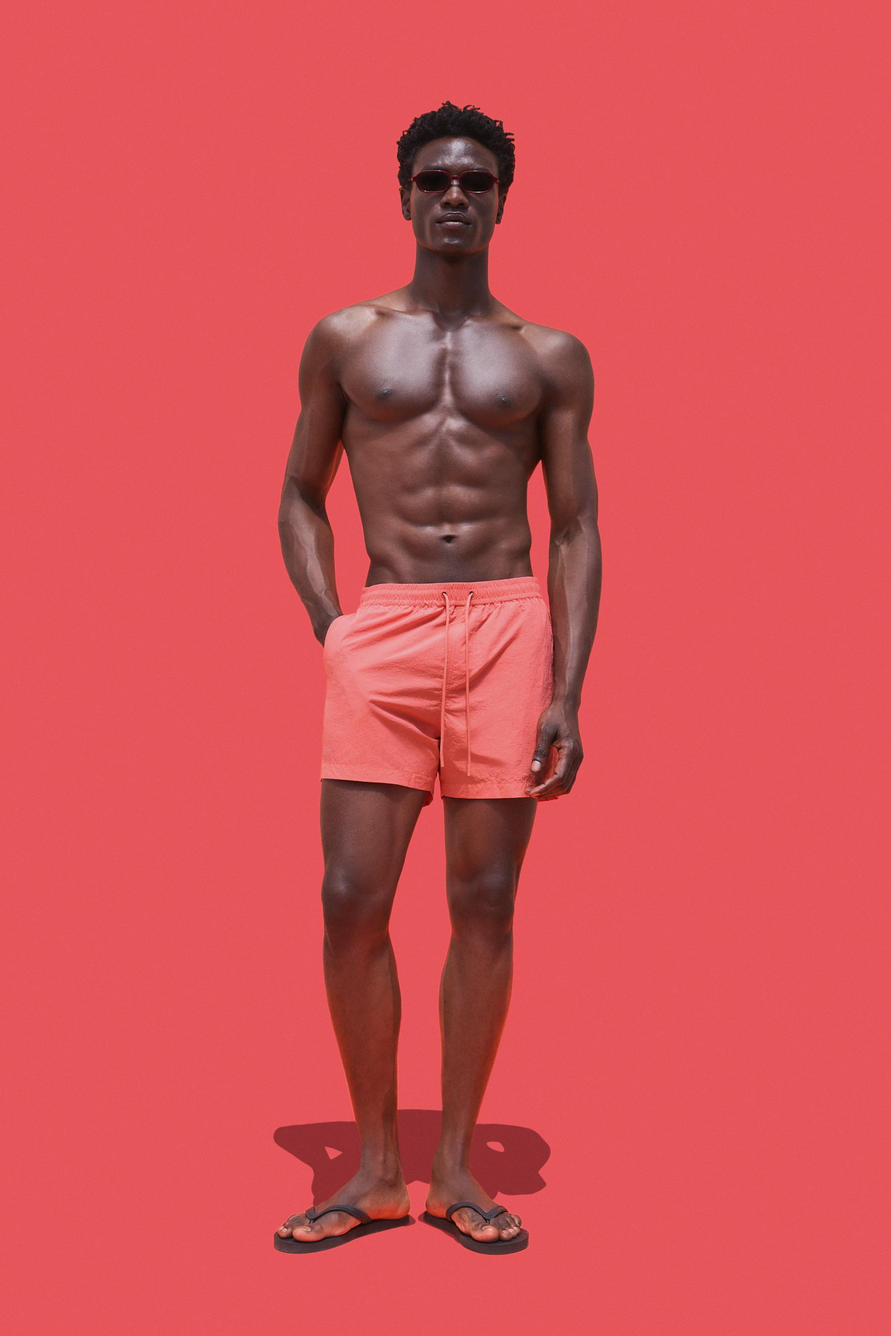 Coloro x Lefties straight swim trunks — CORAL RED