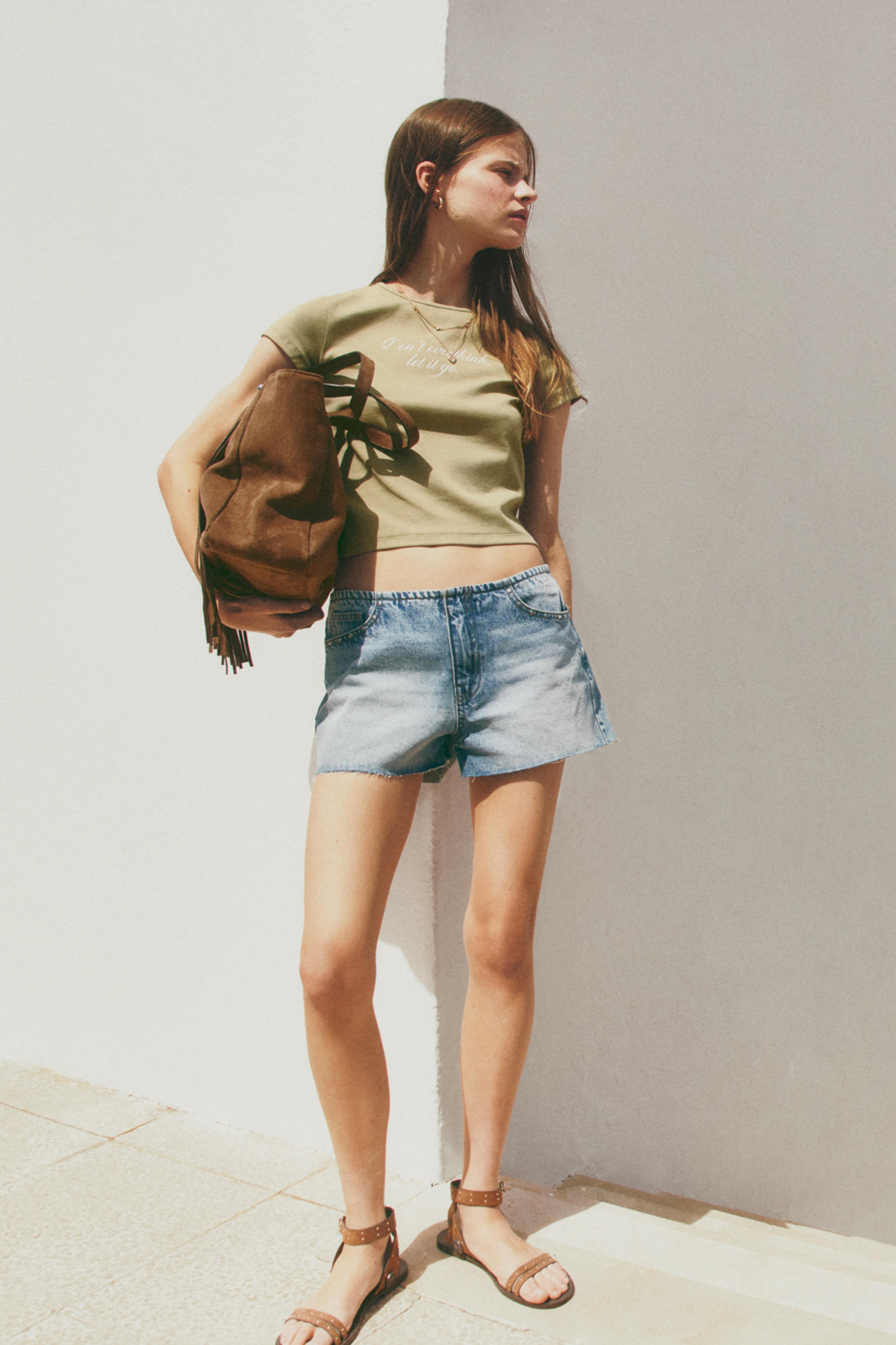 Studded denim shorts — INDIGO