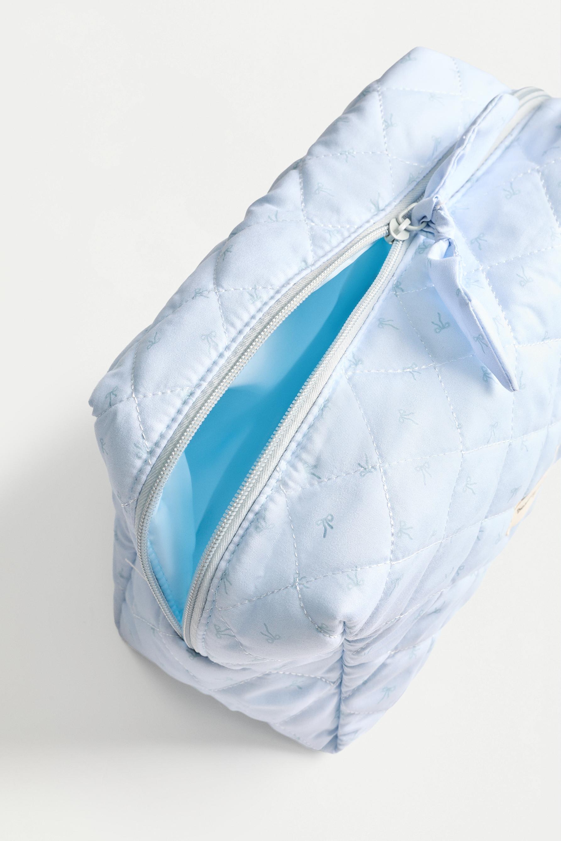 Large bow print toiletry bag — PASTEL BLUE