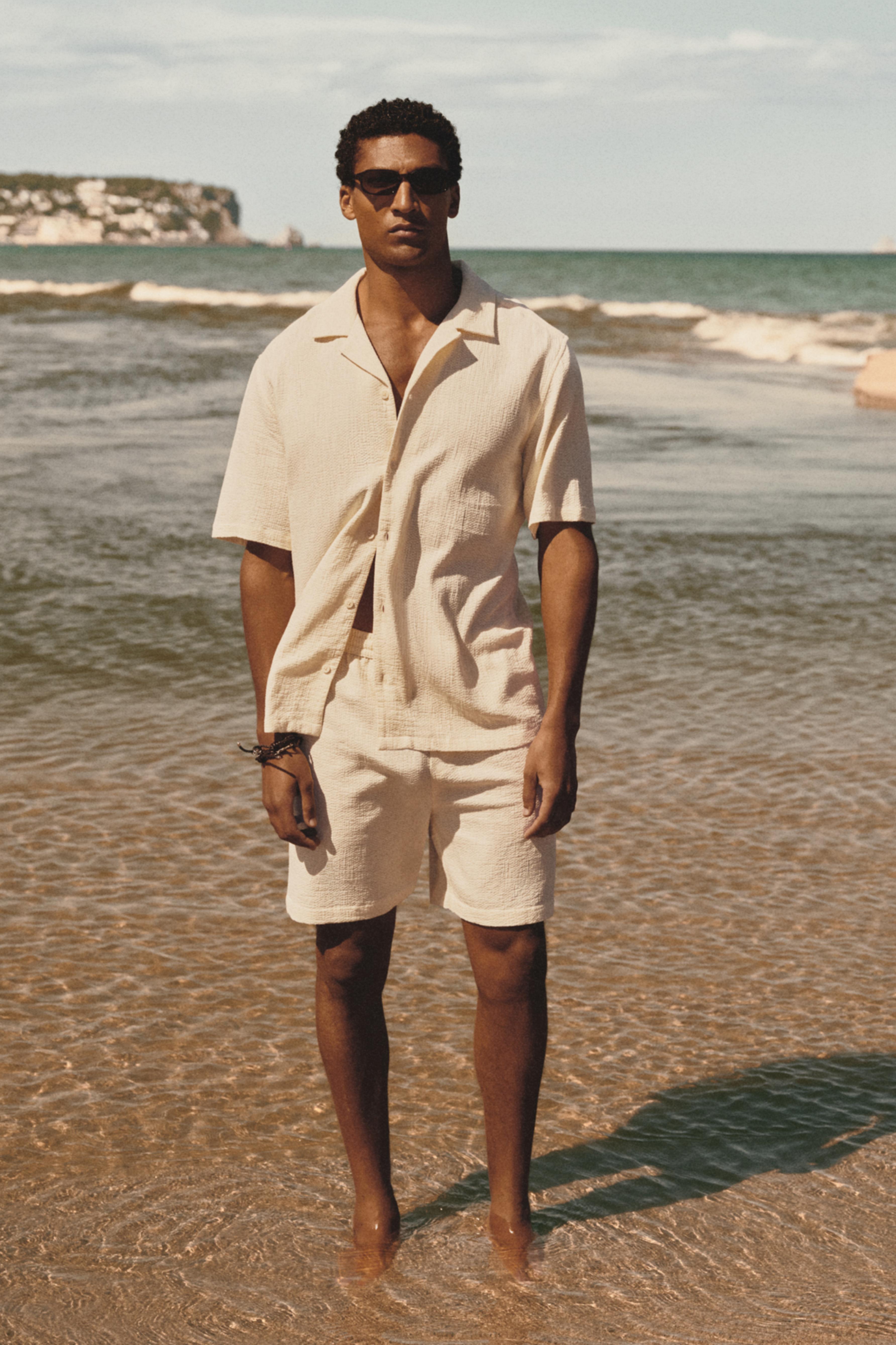 Waffle-textured Bermuda shorts — ECRU