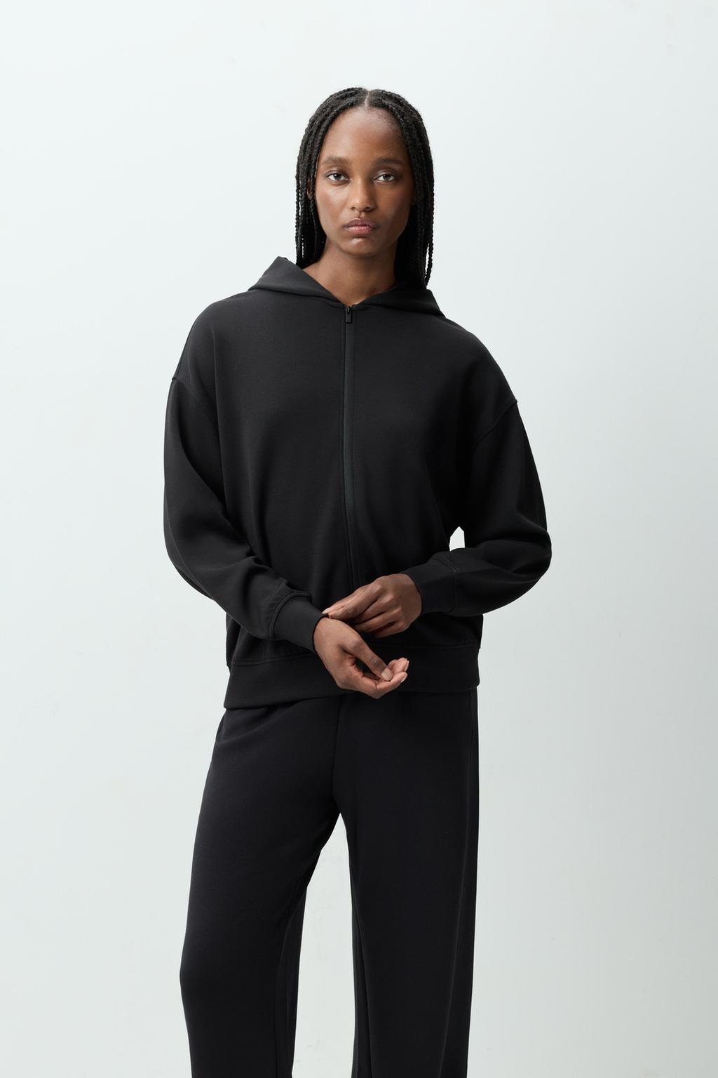 Dessuadora esportiva oversize
