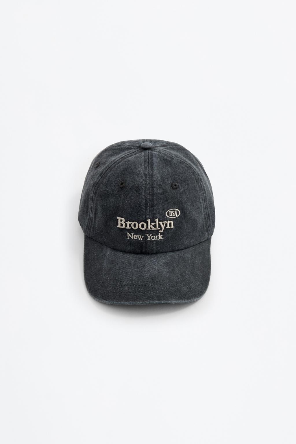 Faded-effect embroidered cap