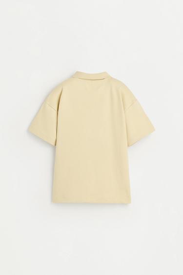 Interlock polo shirt with text — VANILLA 2