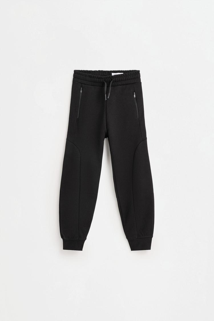 Interlock plush joggers — BLACK