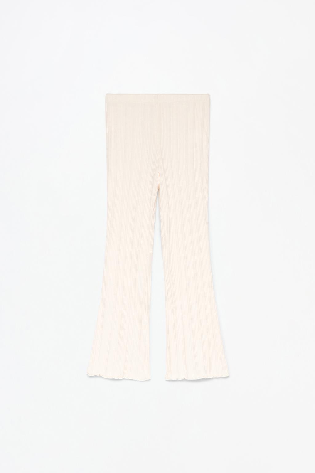Flared cutwork trousers