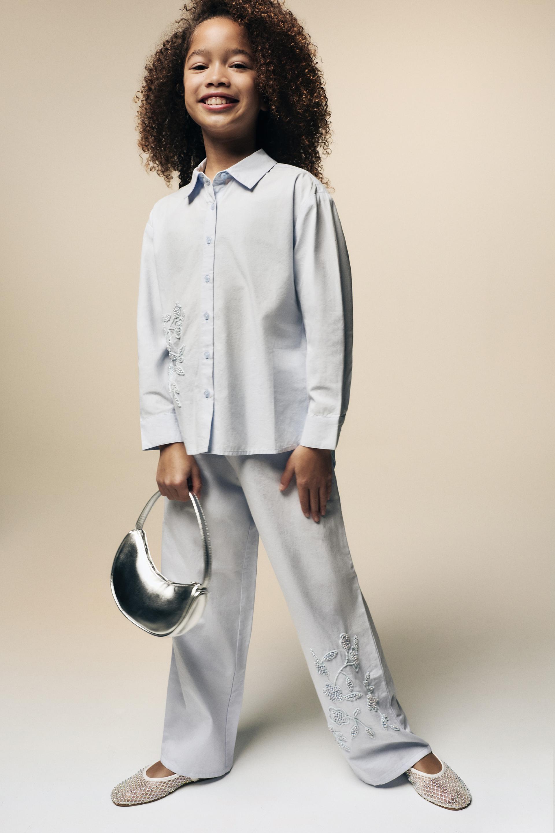 Pantalón apliques flores