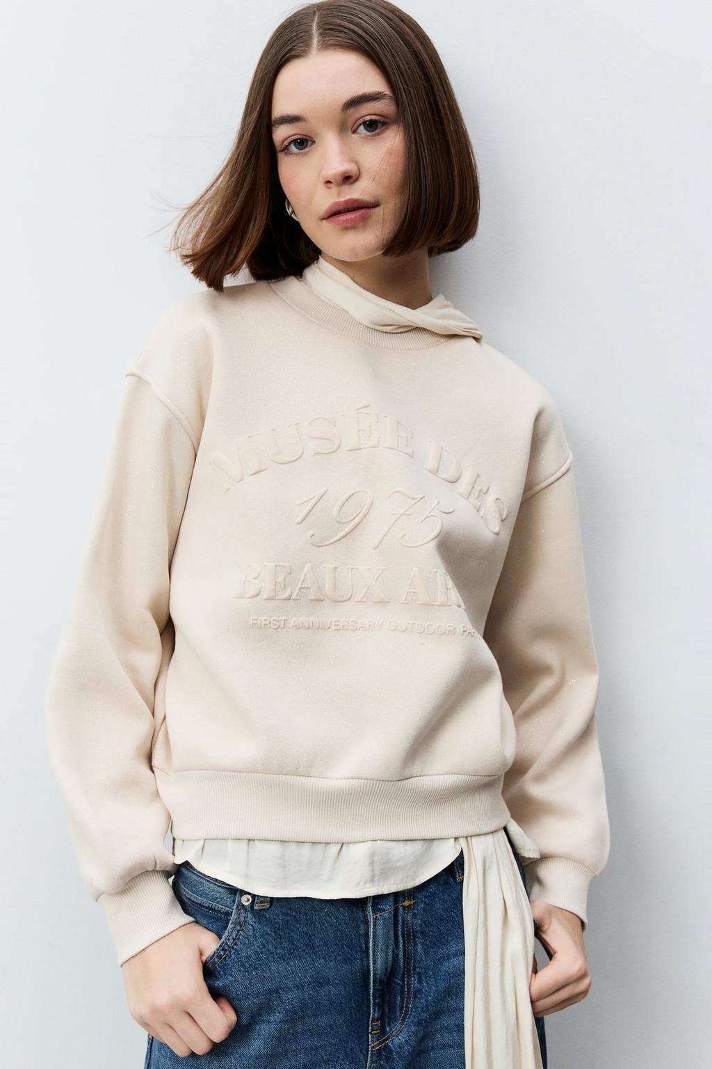 Shimmery slogan sweatshirt